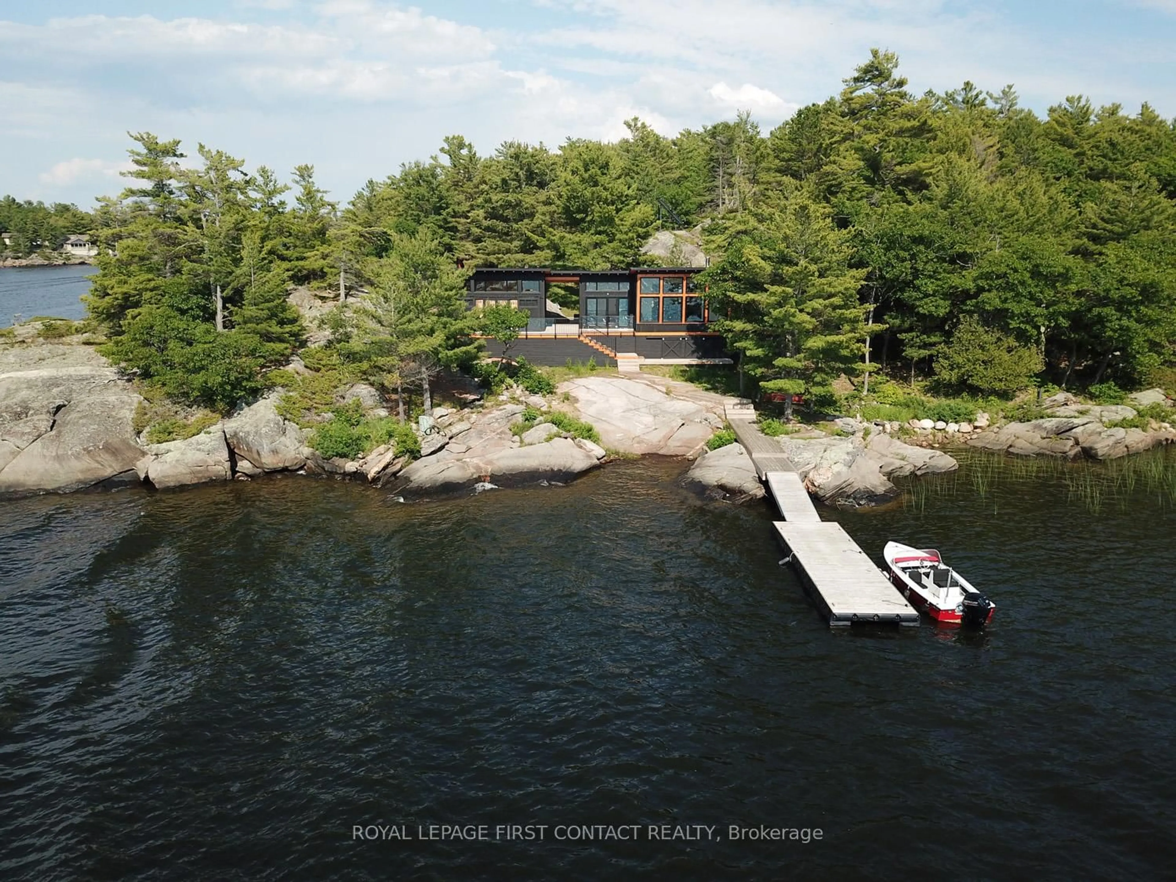 A pic from outside/outdoor area/front of a property/back of a property/a pic from drone, water/lake/river/ocean view for 23 A26 Island, The Archipelago Ontario P0G 1K0