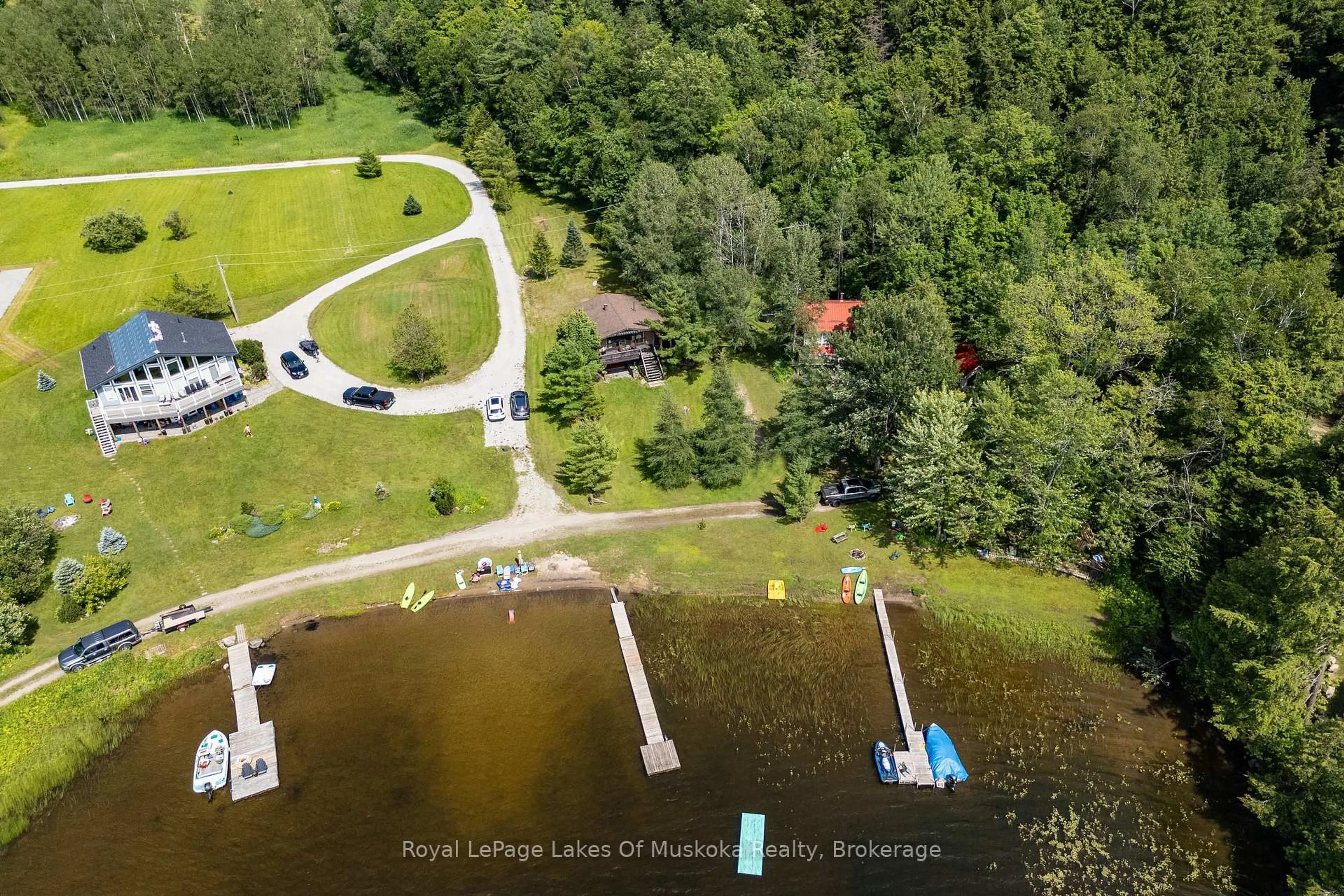 A pic from outside/outdoor area/front of a property/back of a property/a pic from drone, water/lake/river/ocean view for 1357 Russ Hammell Rd, Muskoka Lakes Ontario P0B 1M0