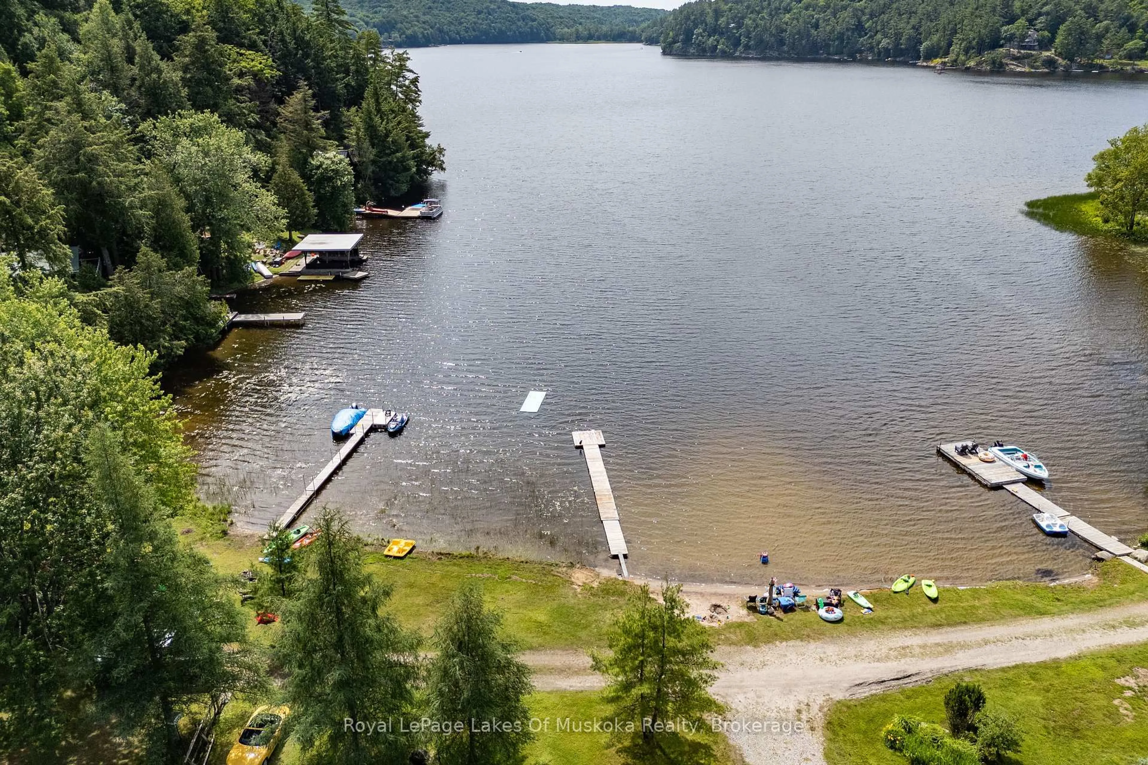 A pic from outside/outdoor area/front of a property/back of a property/a pic from drone, water/lake/river/ocean view for 1357 Russ Hammell Rd, Muskoka Lakes Ontario P0B 1M0