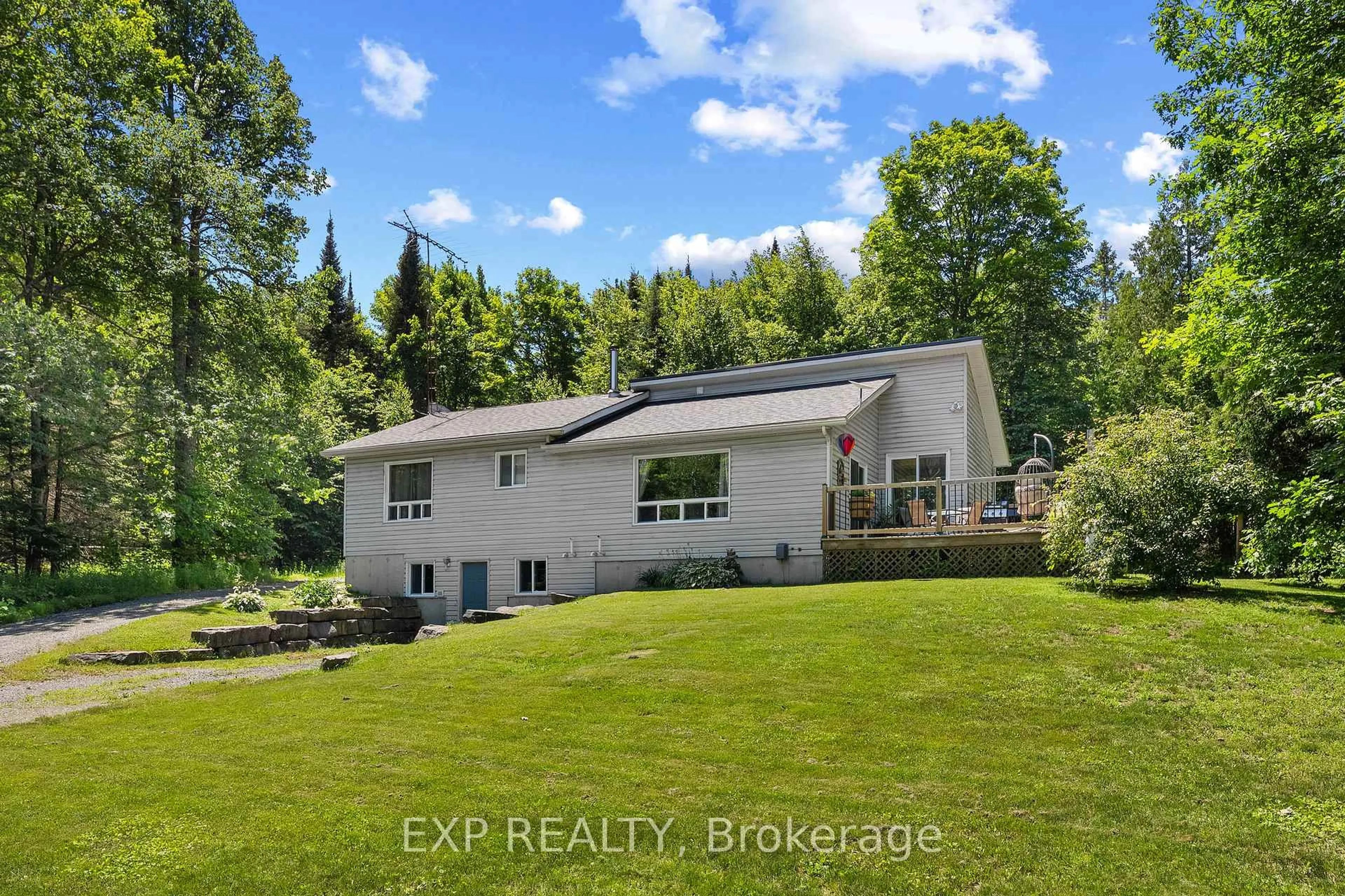 A pic from outside/outdoor area/front of a property/back of a property/a pic from drone, water/lake/river/ocean view for 230 Kartuzy Rd, Barry's Bay Ontario K0J 1B0