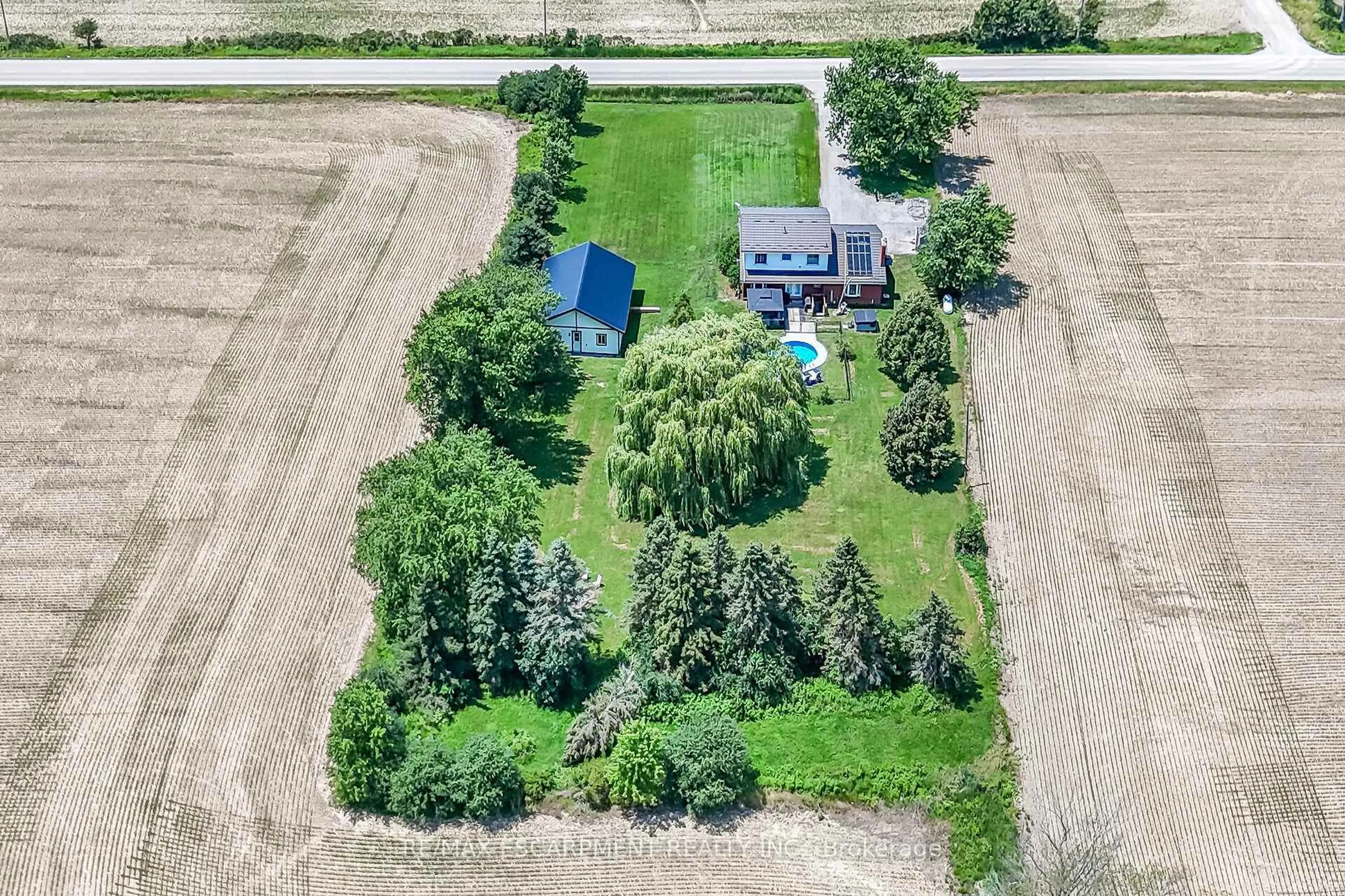 A pic from outside/outdoor area/front of a property/back of a property/a pic from drone, unknown for 1284 Cheapside Rd, Haldimand Ontario N0A 1J0