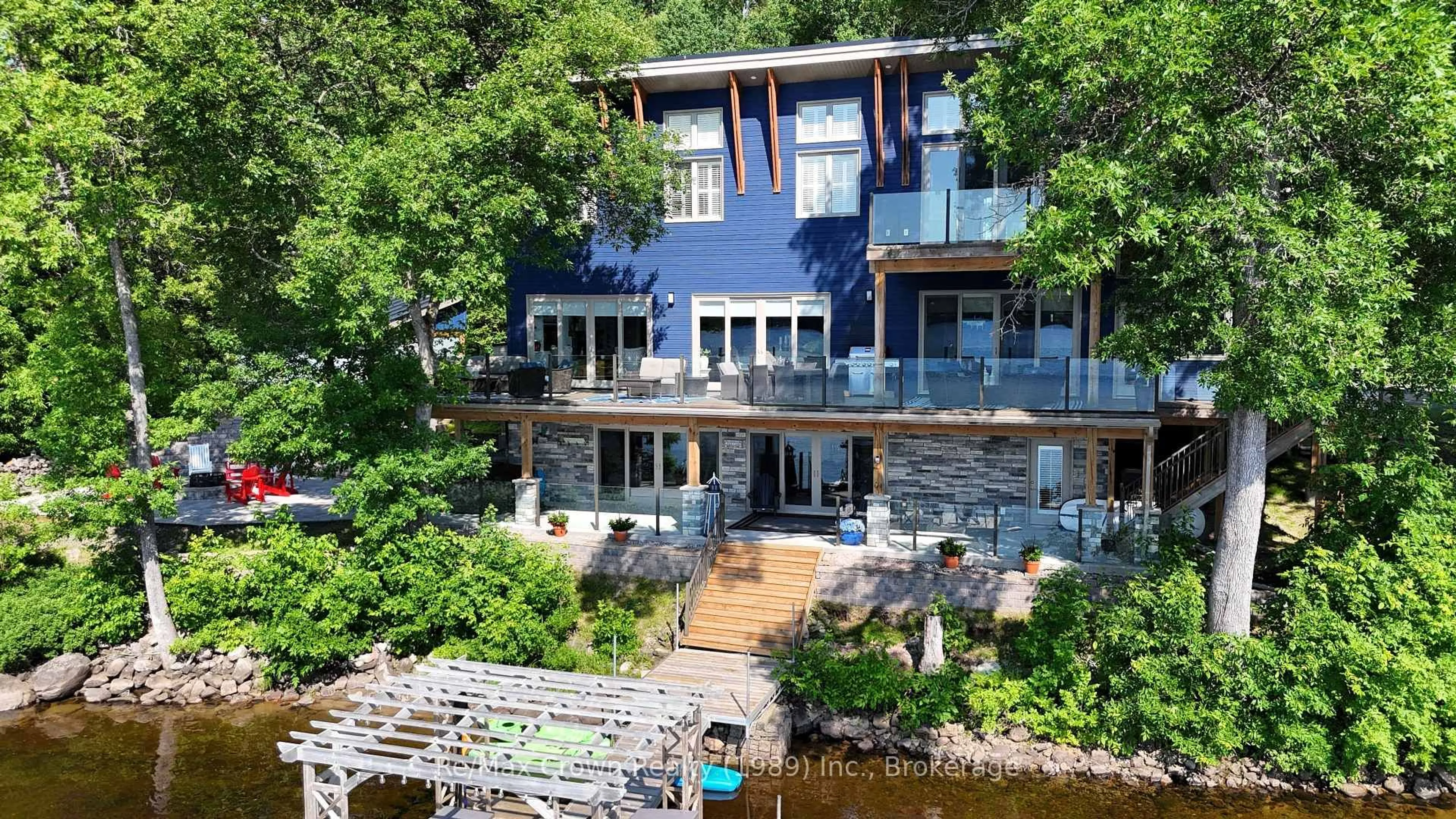 A pic from outside/outdoor area/front of a property/back of a property/a pic from drone, water/lake/river/ocean view for 7313 534 Highway, Parry Sound Remote Area Ontario P0H 2R0