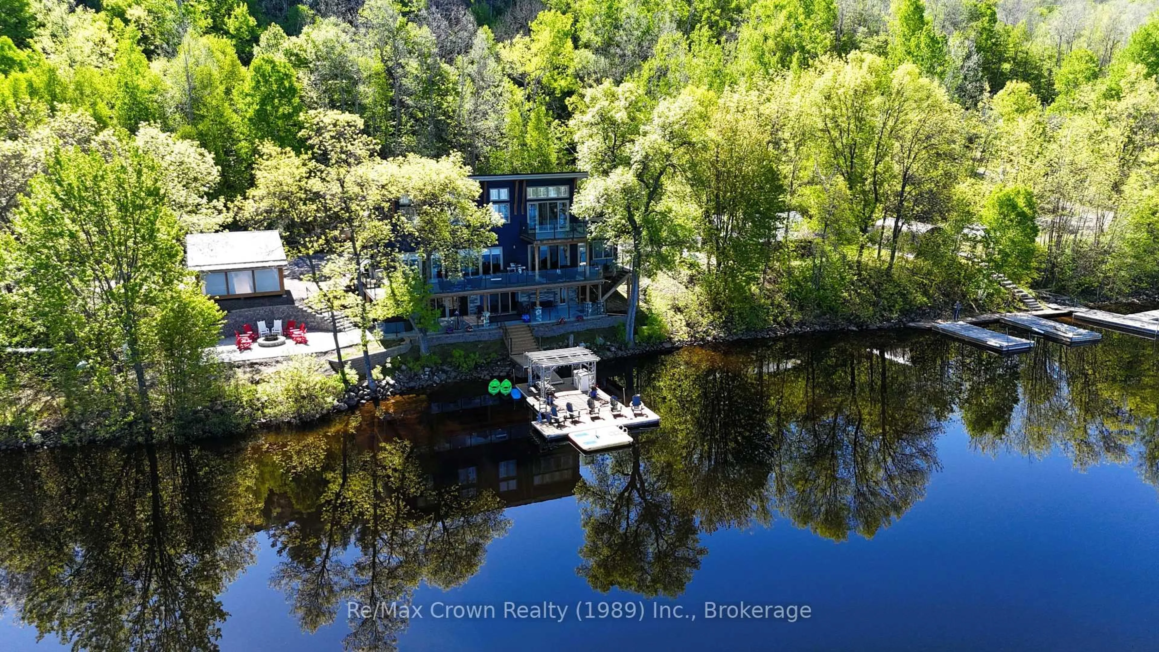 A pic from outside/outdoor area/front of a property/back of a property/a pic from drone, water/lake/river/ocean view for 7313 534 Highway, Parry Sound Remote Area Ontario P0H 2R0