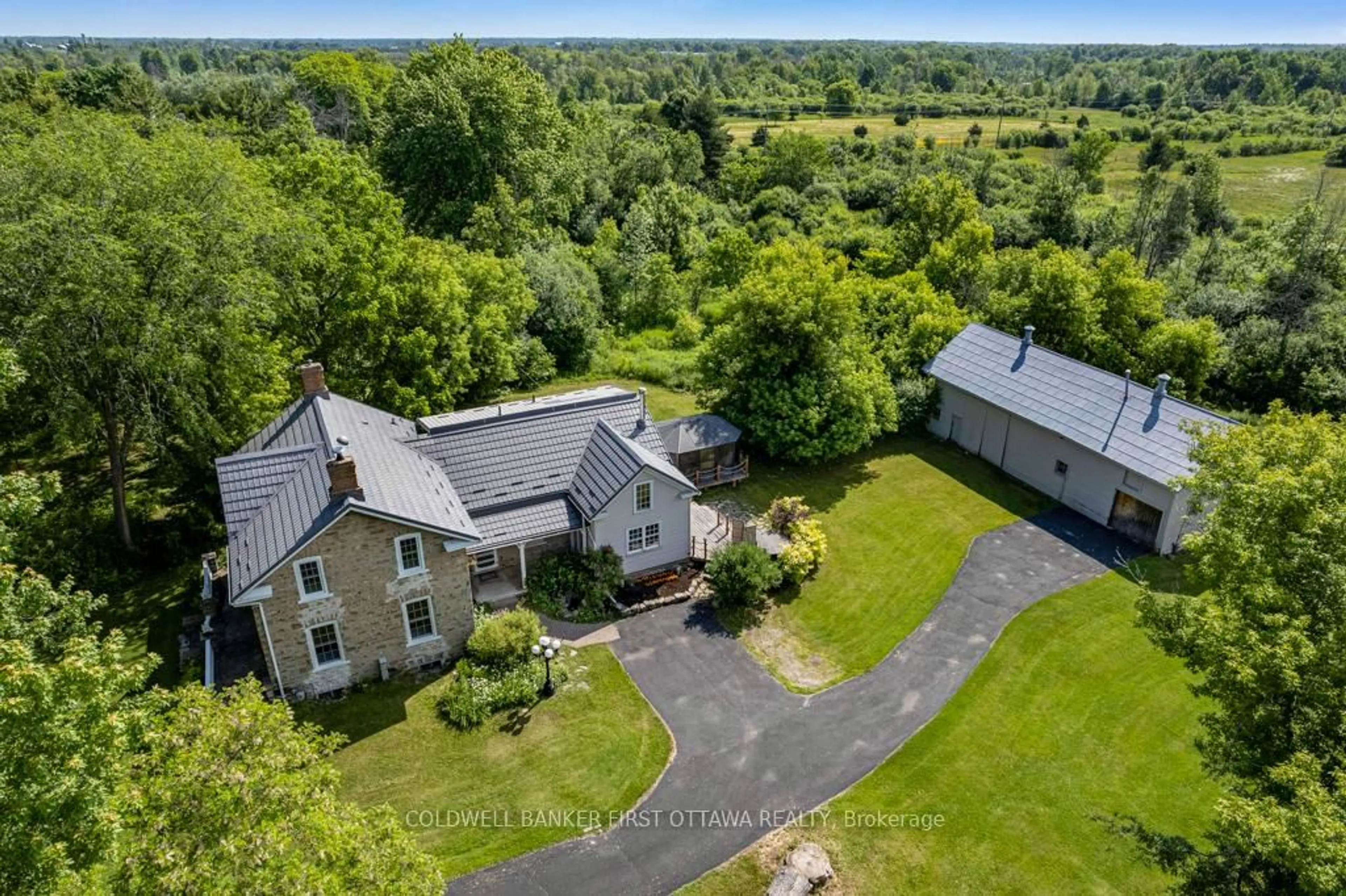 A pic from outside/outdoor area/front of a property/back of a property/a pic from drone, water/lake/river/ocean view for 28 South St, Drummond/North Elmsley Ontario K7H 2G1