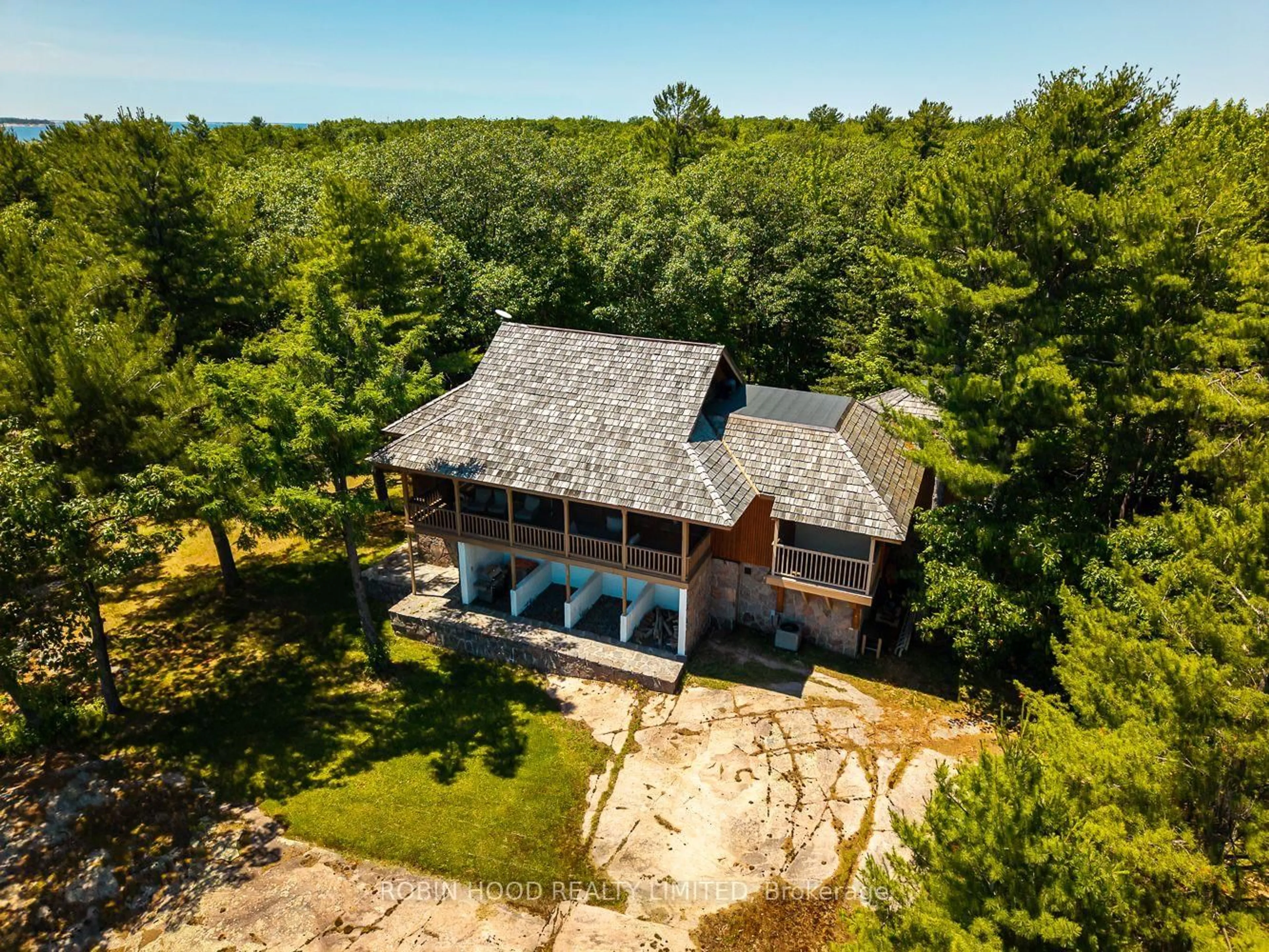 A pic from outside/outdoor area/front of a property/back of a property/a pic from drone, water/lake/river/ocean view for 47 Linda Lane #Rear, Carling Ontario P0G 1G0