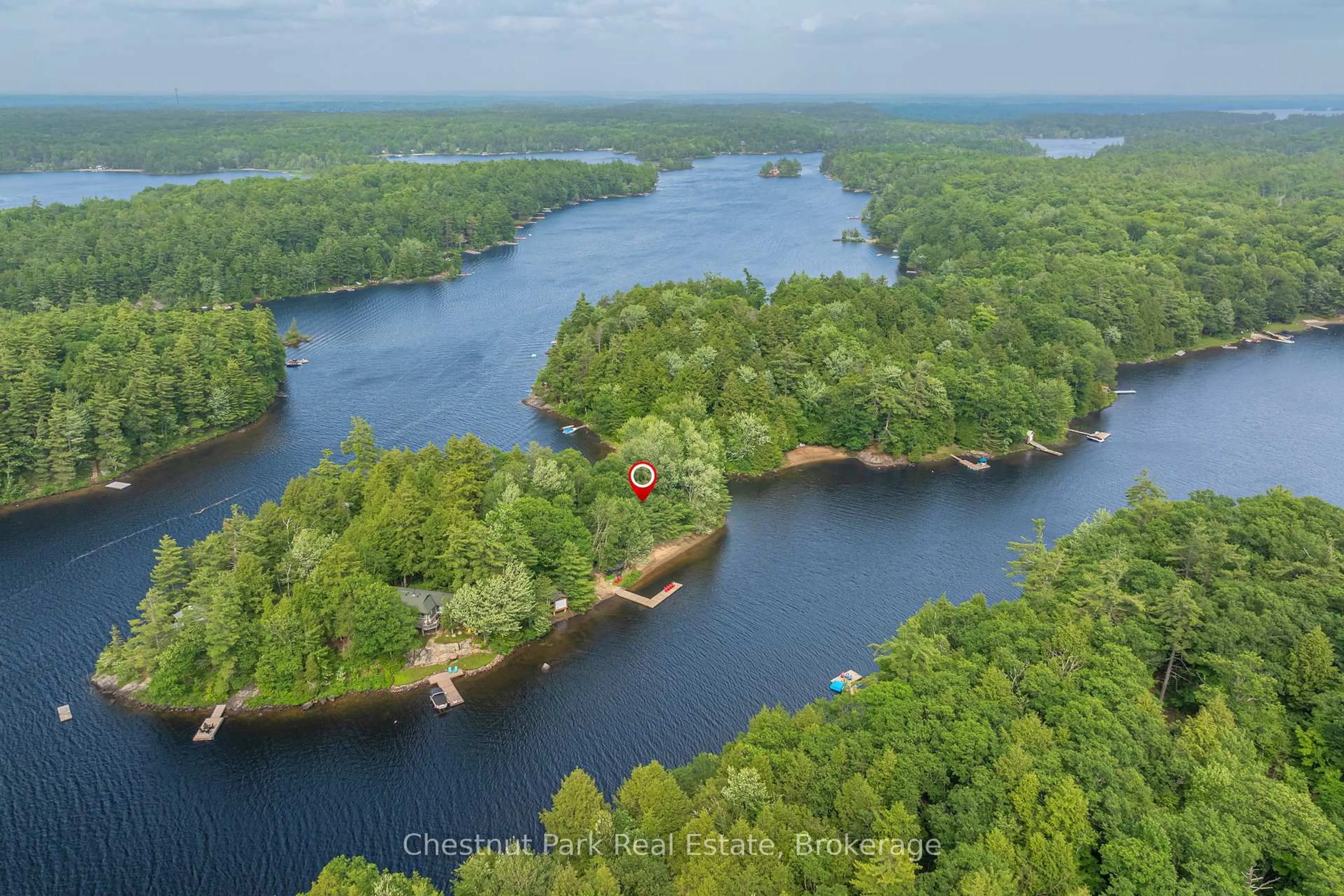 A pic from outside/outdoor area/front of a property/back of a property/a pic from drone, water/lake/river/ocean view for 1071 STRACHAN POINT Rd, Muskoka Lakes Ontario P0C 1A0