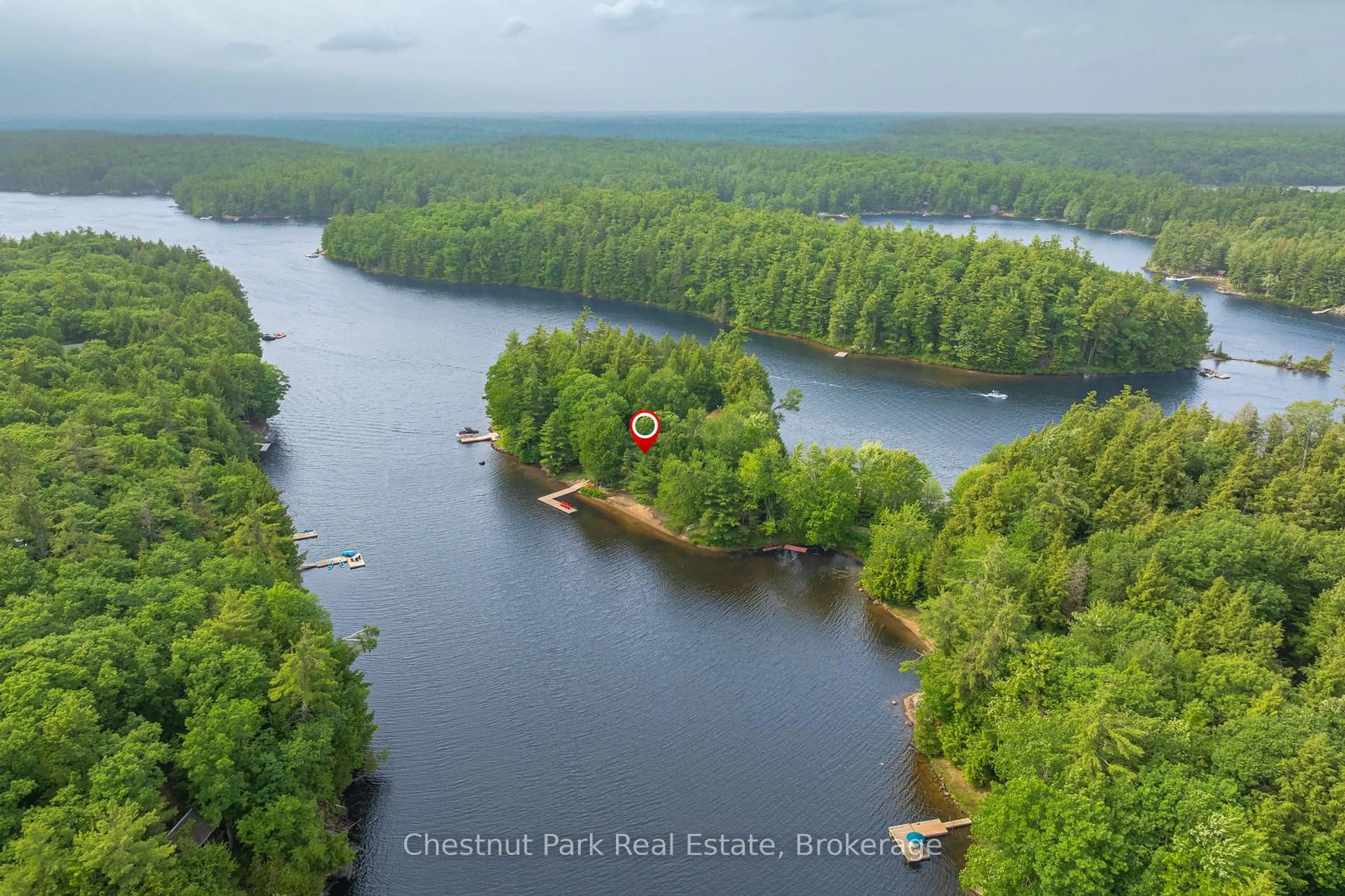 A pic from outside/outdoor area/front of a property/back of a property/a pic from drone, water/lake/river/ocean view for 1071 STRACHAN POINT Rd, Muskoka Lakes Ontario P0C 1A0