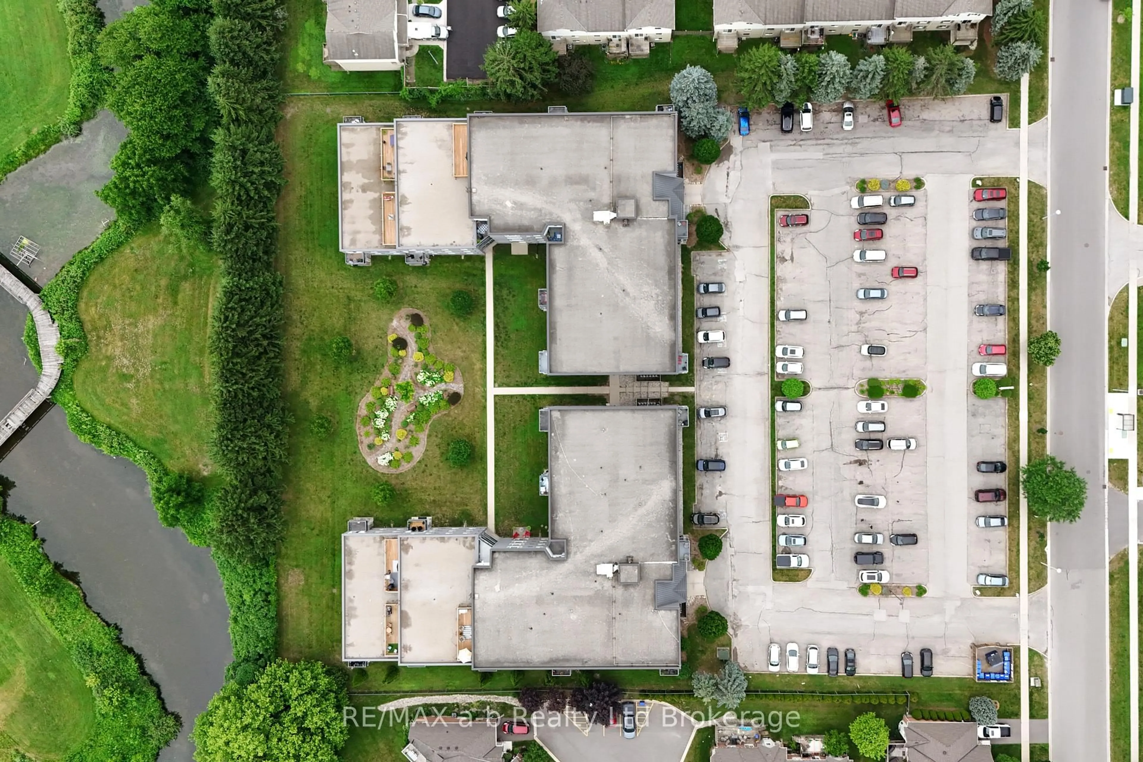 A pic from outside/outdoor area/front of a property/back of a property/a pic from drone, street for 159 Ferguson Dr #303, Woodstock Ontario N4V 1A9