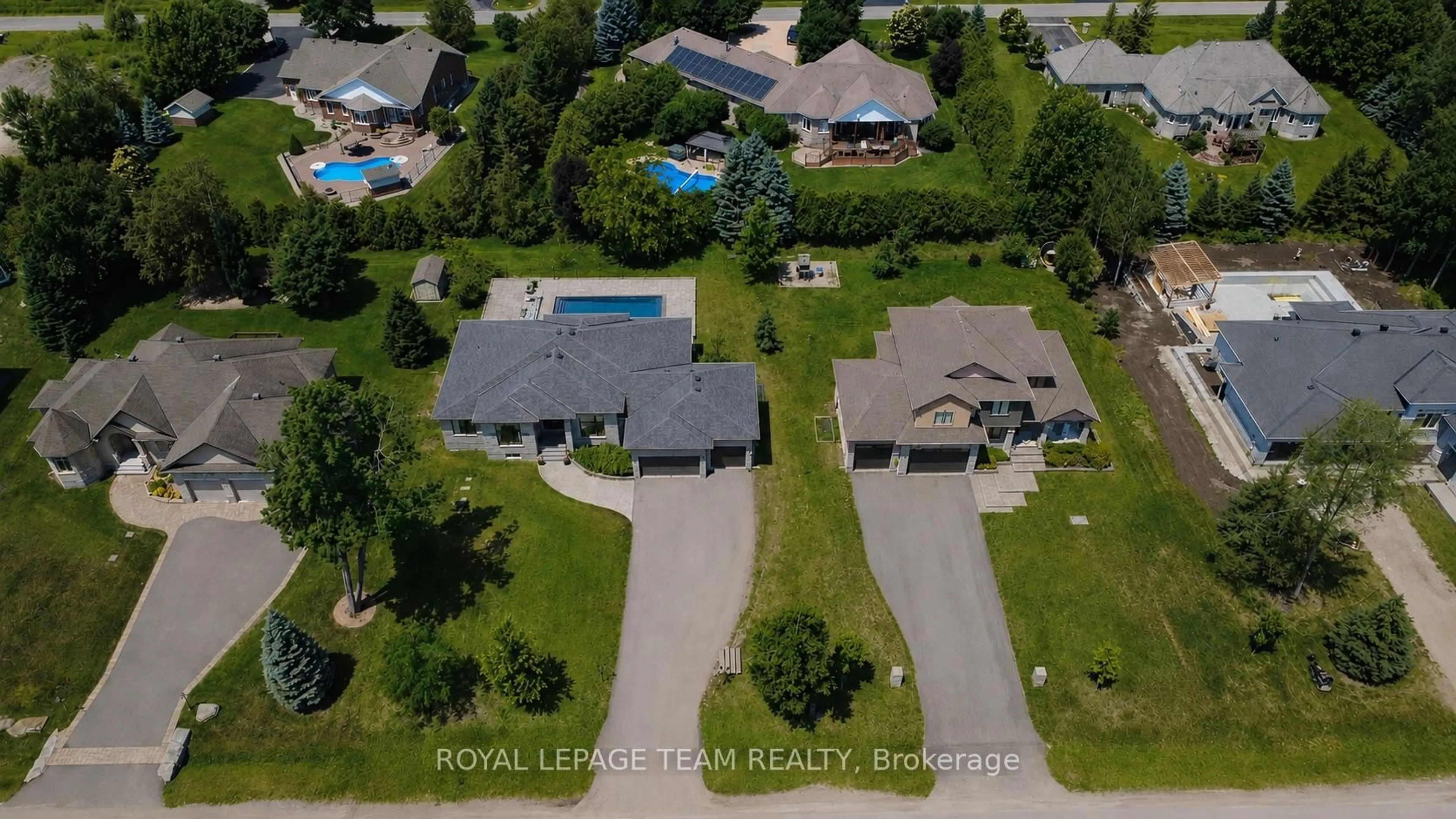 A pic from outside/outdoor area/front of a property/back of a property/a pic from drone, water/lake/river/ocean view for 1801 CEDARLAKES Way, Greely Ontario K4P 1G4