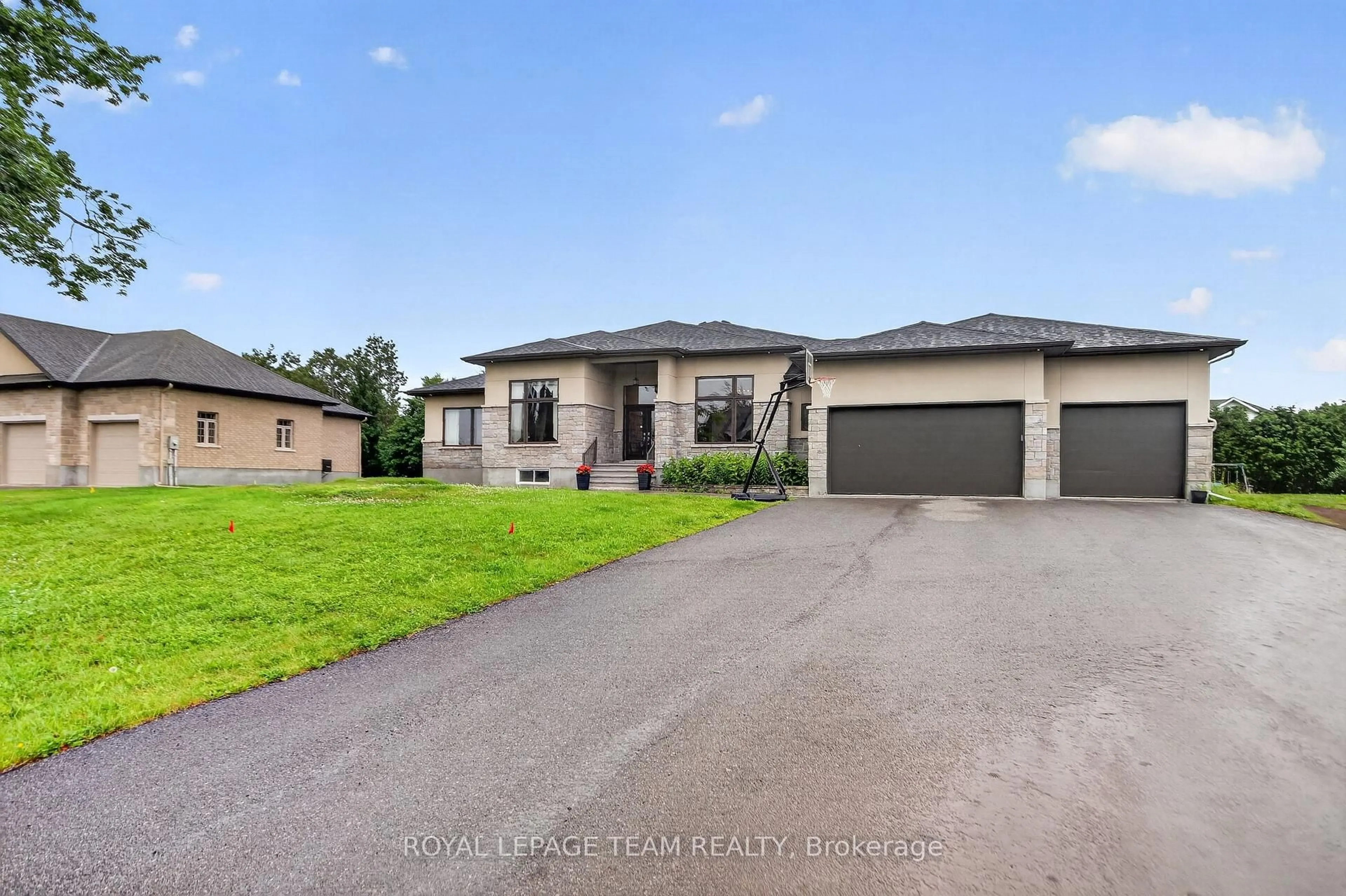 A pic from outside/outdoor area/front of a property/back of a property/a pic from drone, street for 1801 CEDARLAKES Way, Greely Ontario K4P 1G4