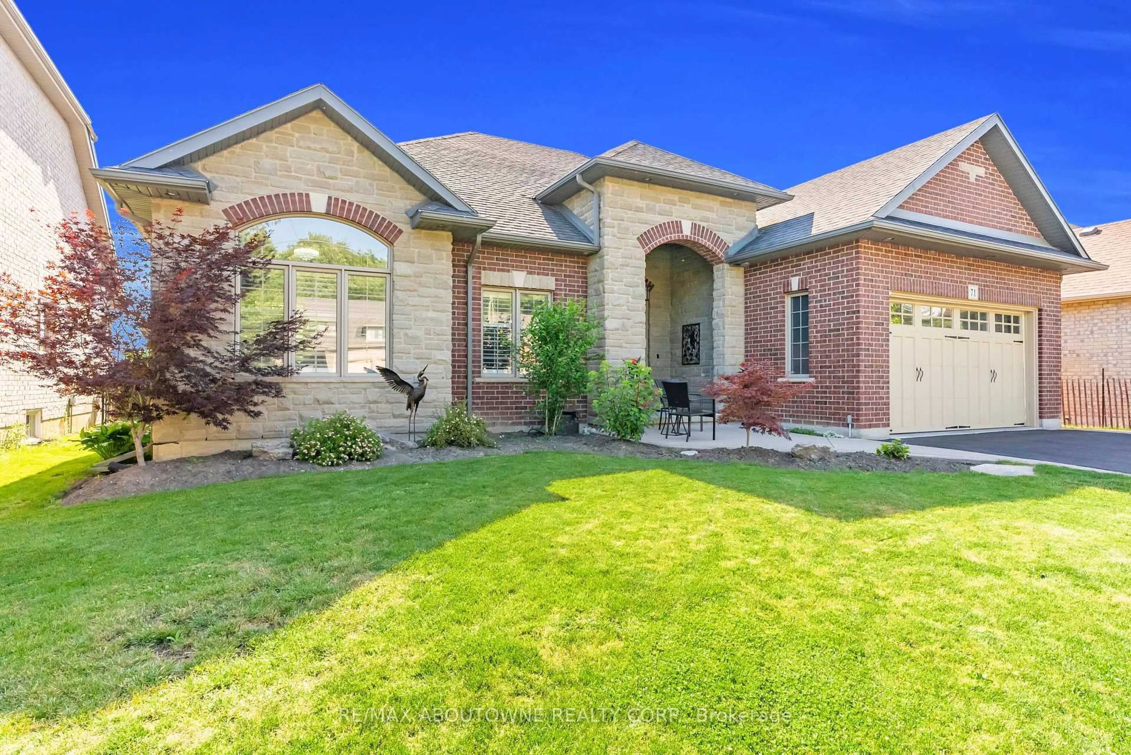 Home with brick exterior material, street for 71 Newport Lane, Norfolk Ontario N0A 1N7