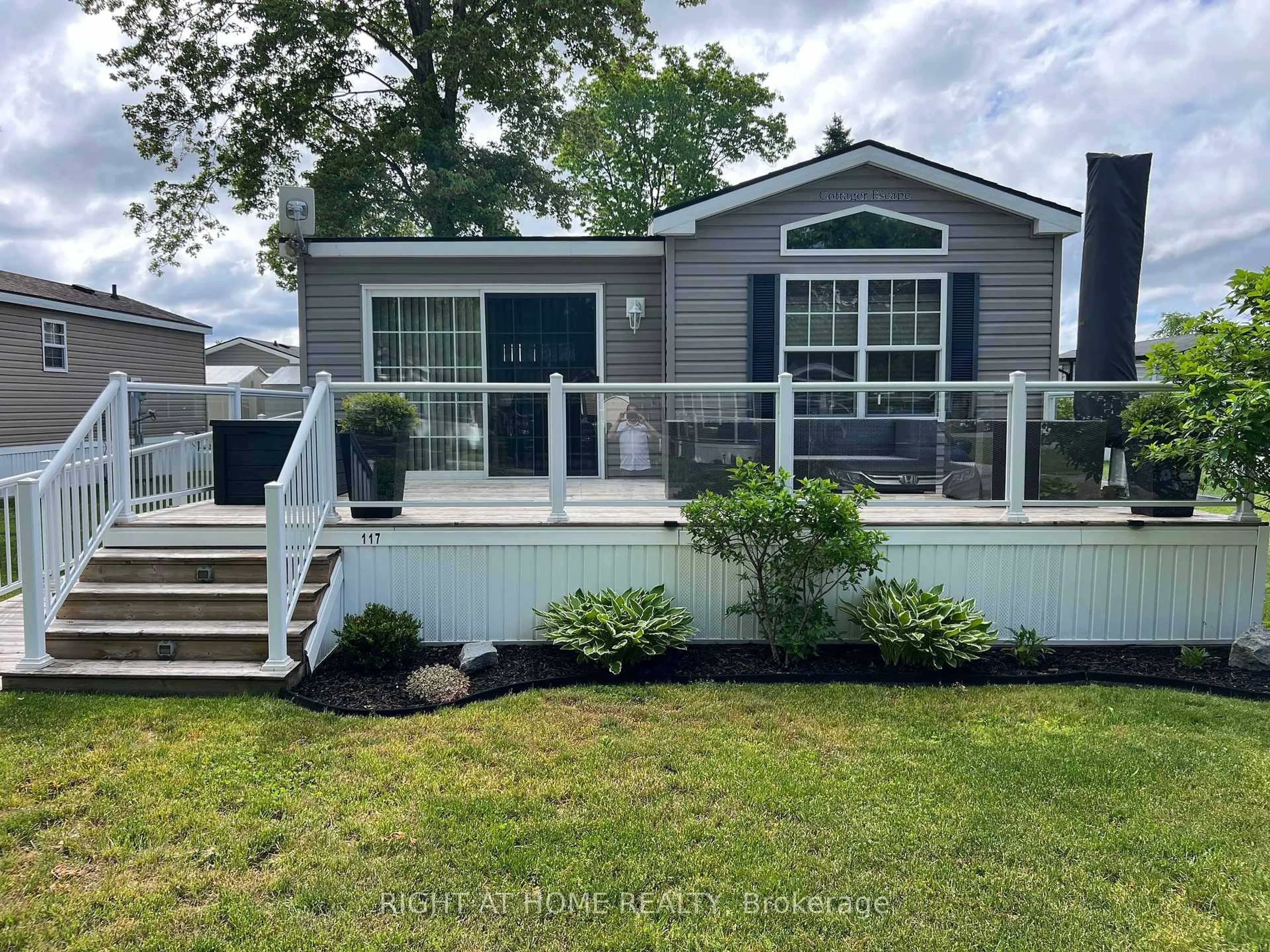 Home with vinyl exterior material, water/lake/river/ocean view for 33 Fire Route 26A Rte #117, Trent Lakes Ontario K0L 1J0