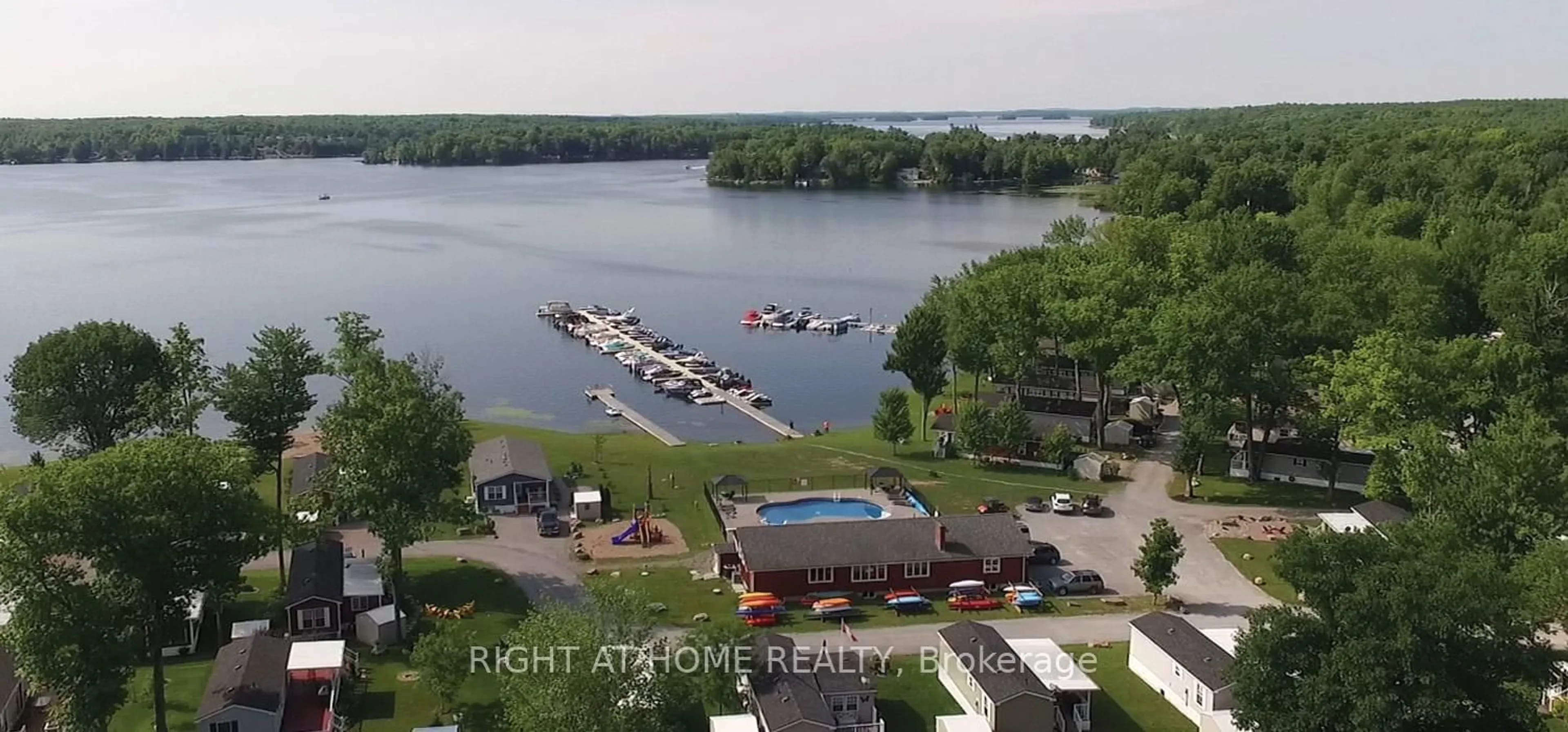 A pic from outside/outdoor area/front of a property/back of a property/a pic from drone, water/lake/river/ocean view for 33 Fire Route 26A Rte #117, Trent Lakes Ontario K0L 1J0