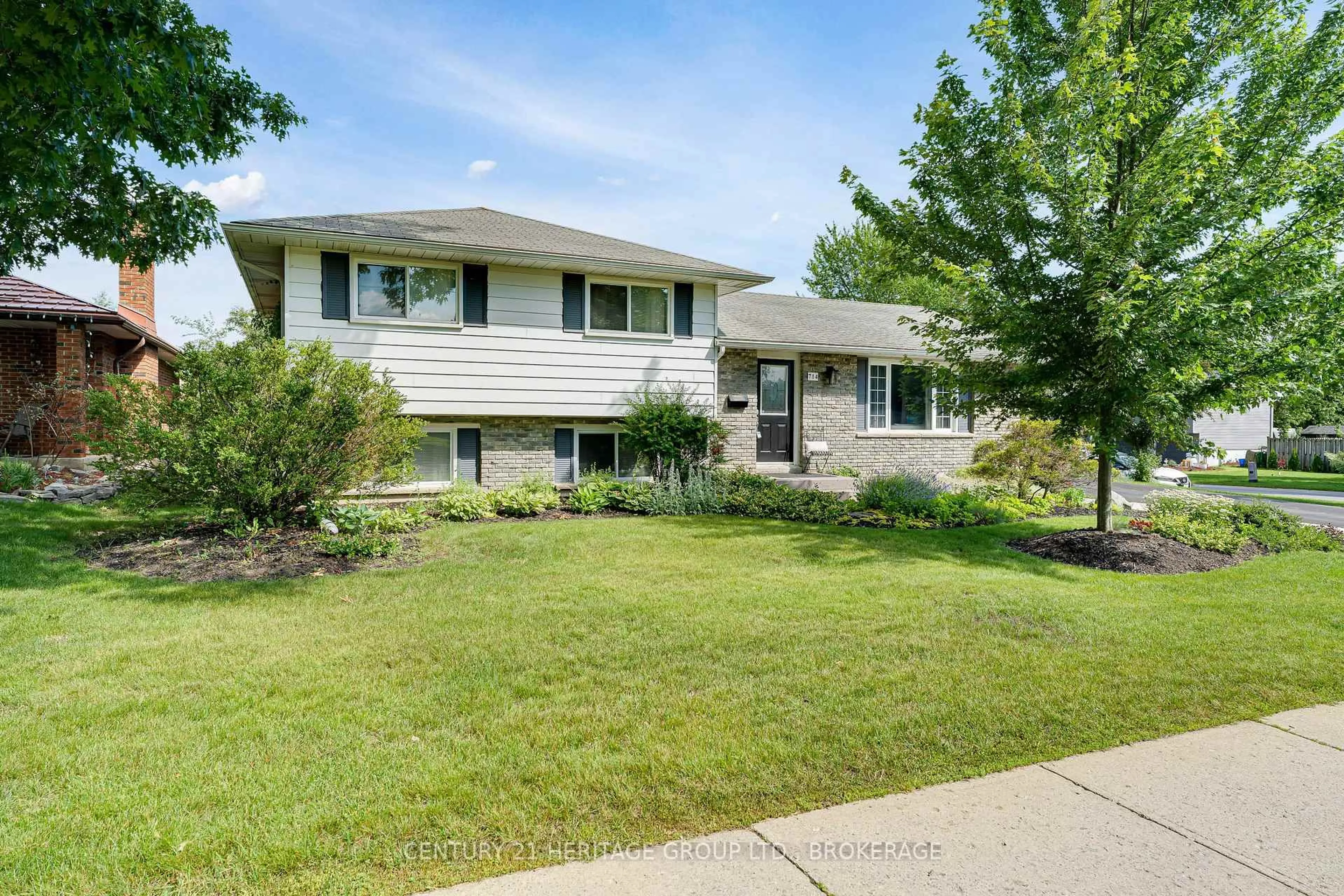Home with vinyl exterior material, street for 714 Milford Dr, Kingston Ontario K7M 6S5
