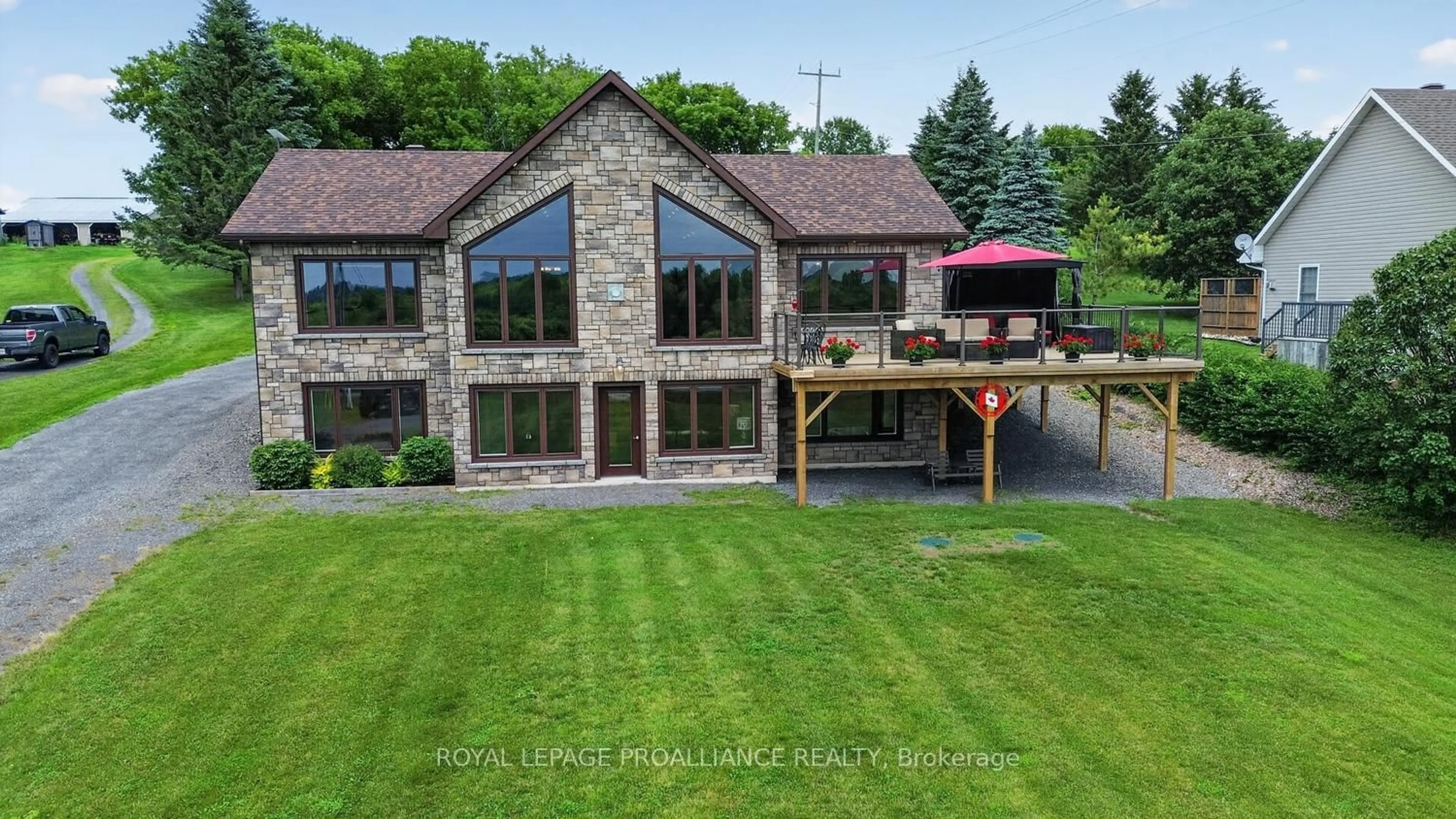 A pic from outside/outdoor area/front of a property/back of a property/a pic from drone, building for 10283 County Road 2 Rd, South Dundas Ontario K0E 1K0