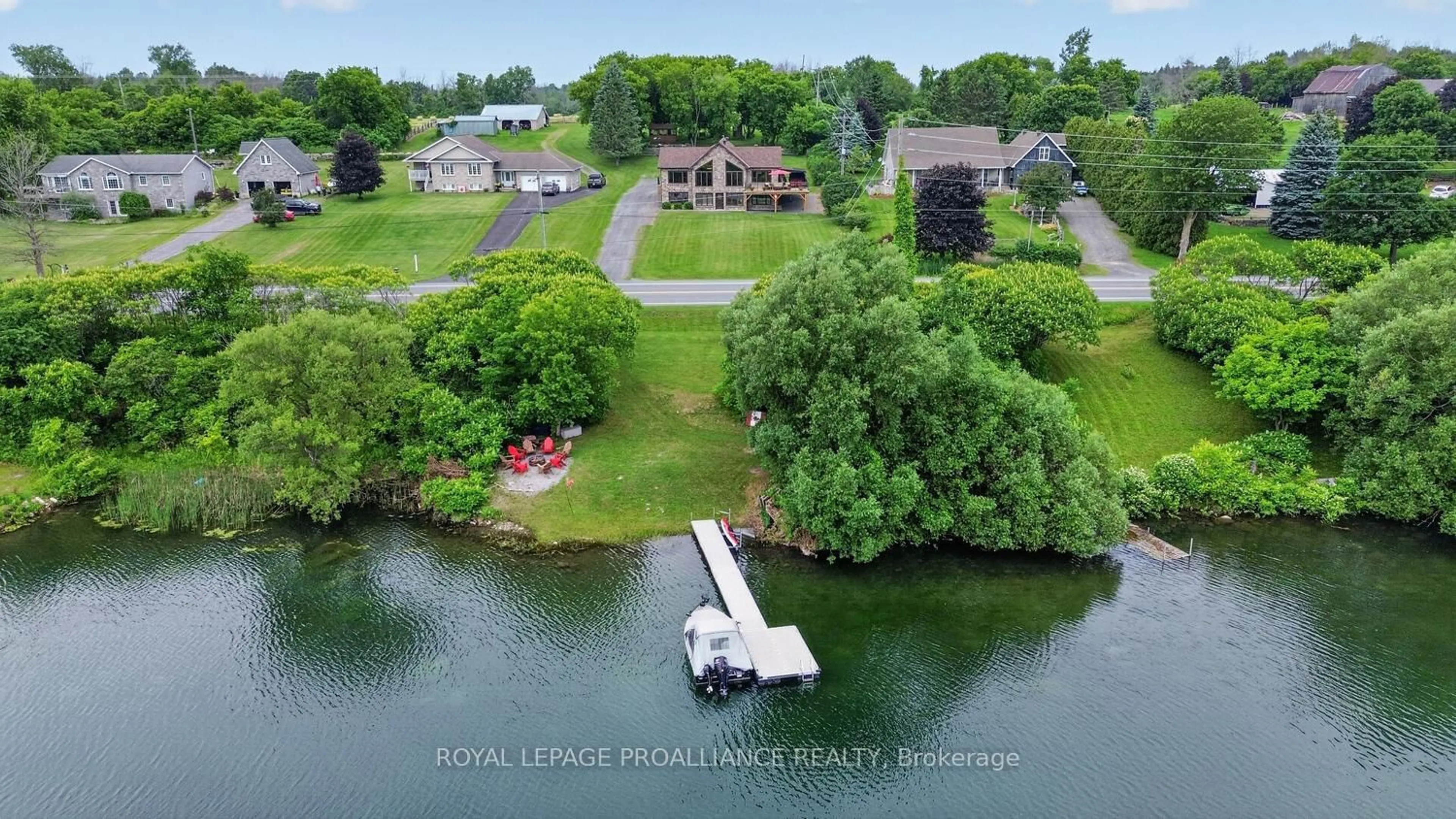 A pic from outside/outdoor area/front of a property/back of a property/a pic from drone, water/lake/river/ocean view for 10283 County Road 2 Rd, South Dundas Ontario K0E 1K0