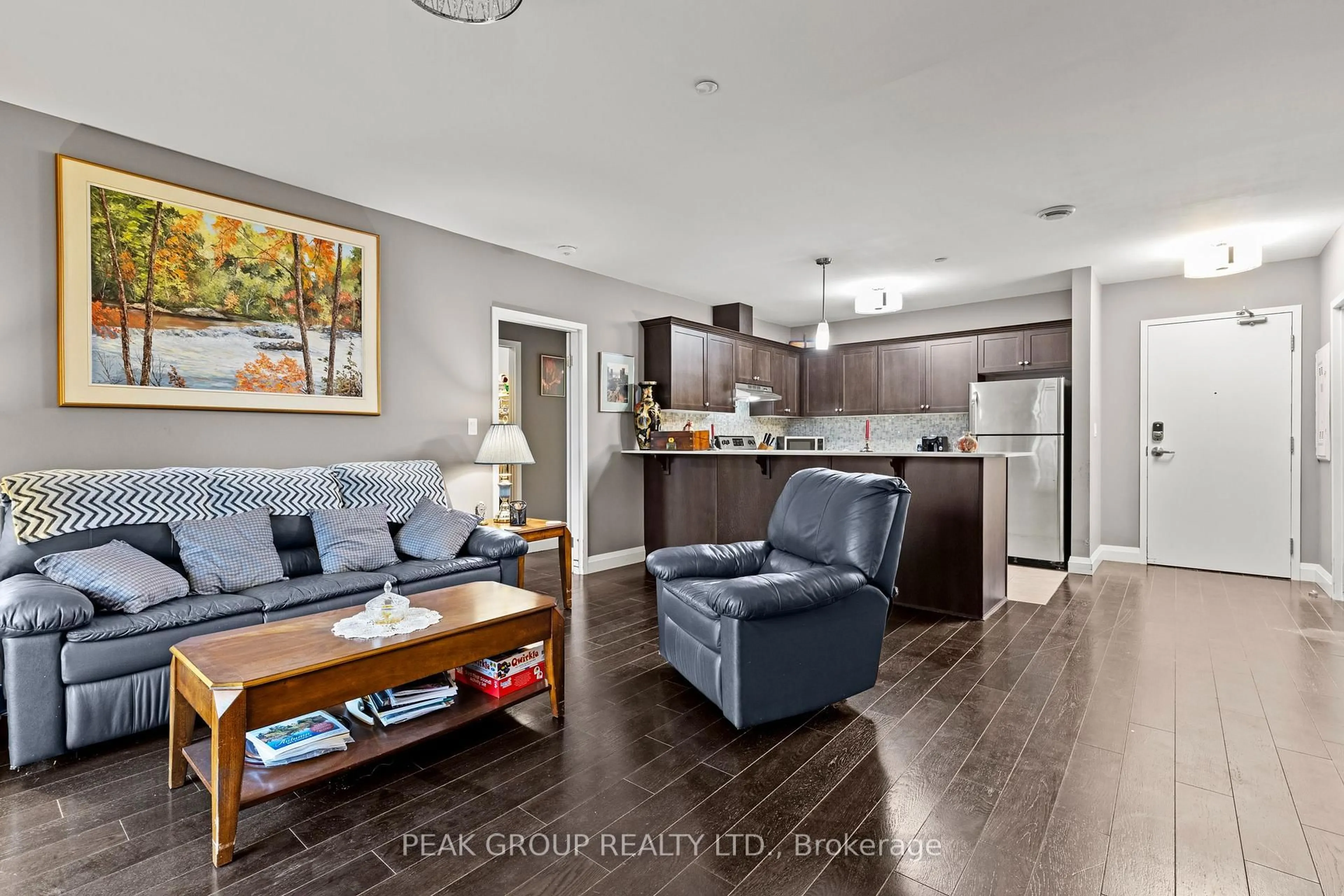 Open concept kitchen, wood/laminate floor for 26 Wellington St #106, St. Catharines Ontario L2R 5P8