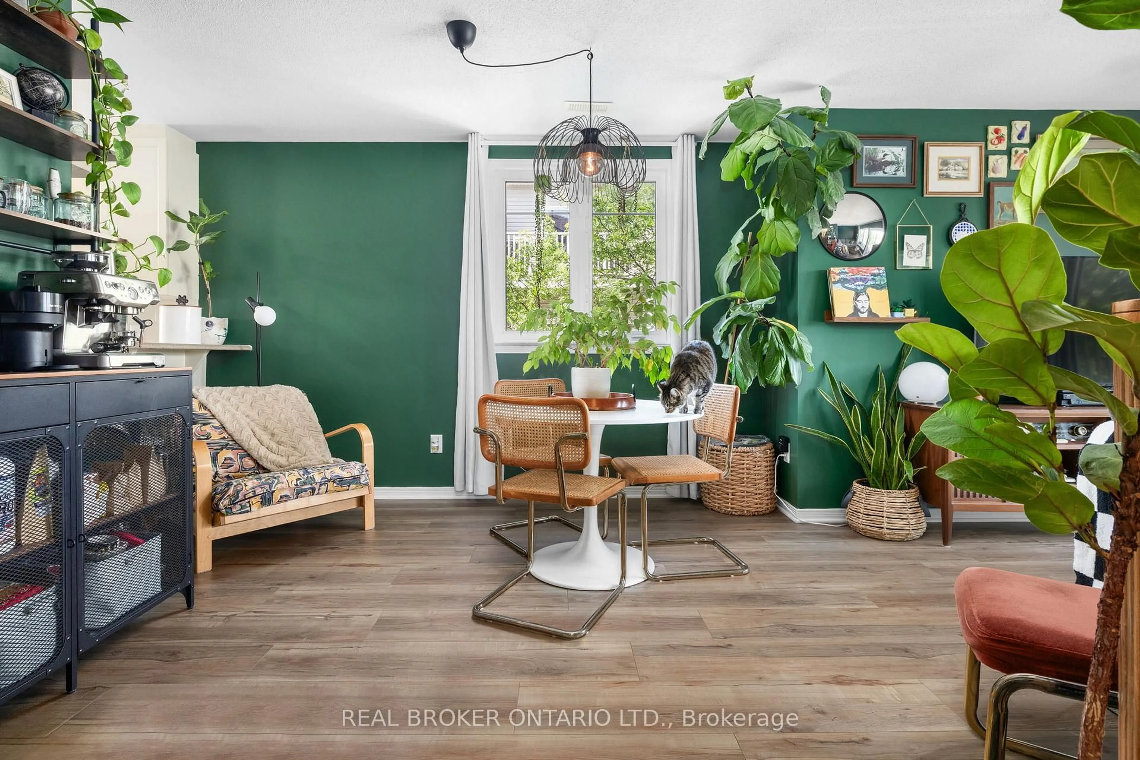 Living room with furniture, wood/laminate floor for 3415 Cambrian Rd, Ottawa Ontario K2J 1S3