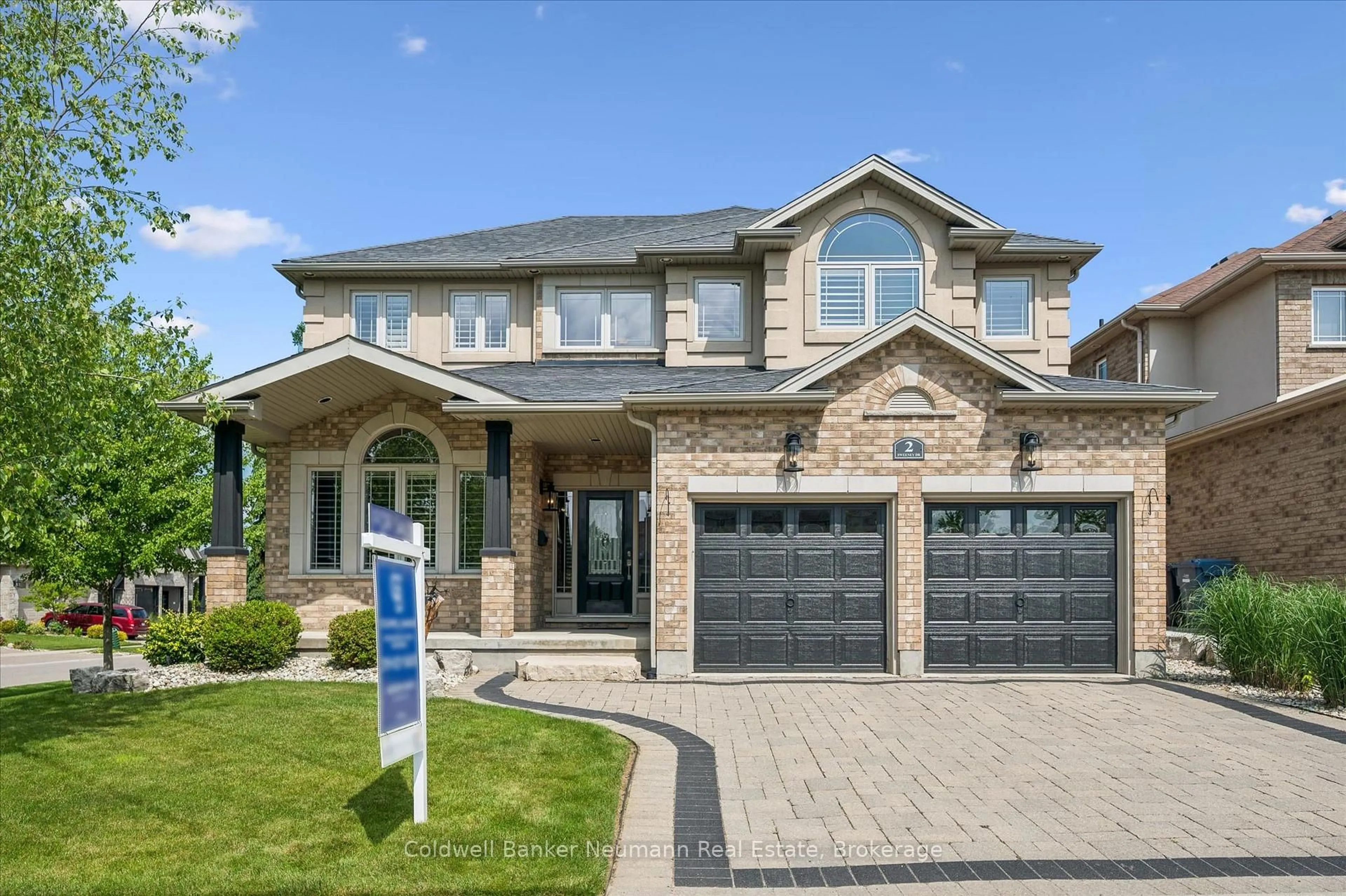 Home with brick exterior material, street for 2 Sweeney Dr, Guelph Ontario N1G 0A5