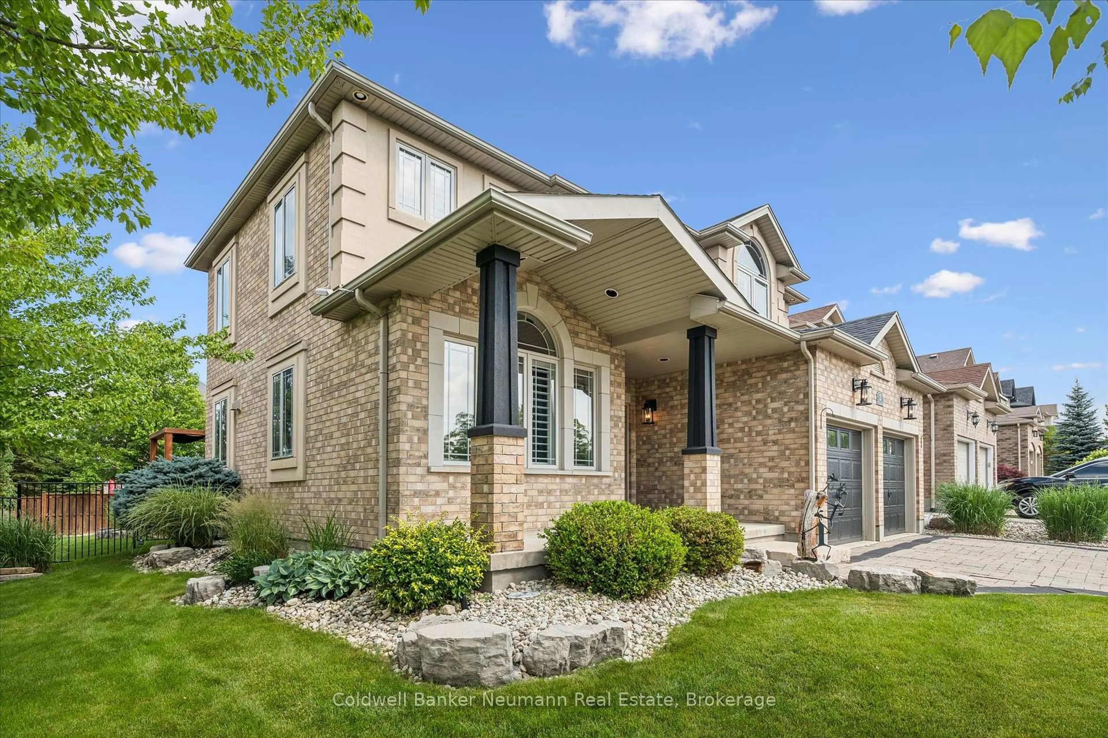 Home with brick exterior material, street for 2 Sweeney Dr, Guelph Ontario N1G 0A5