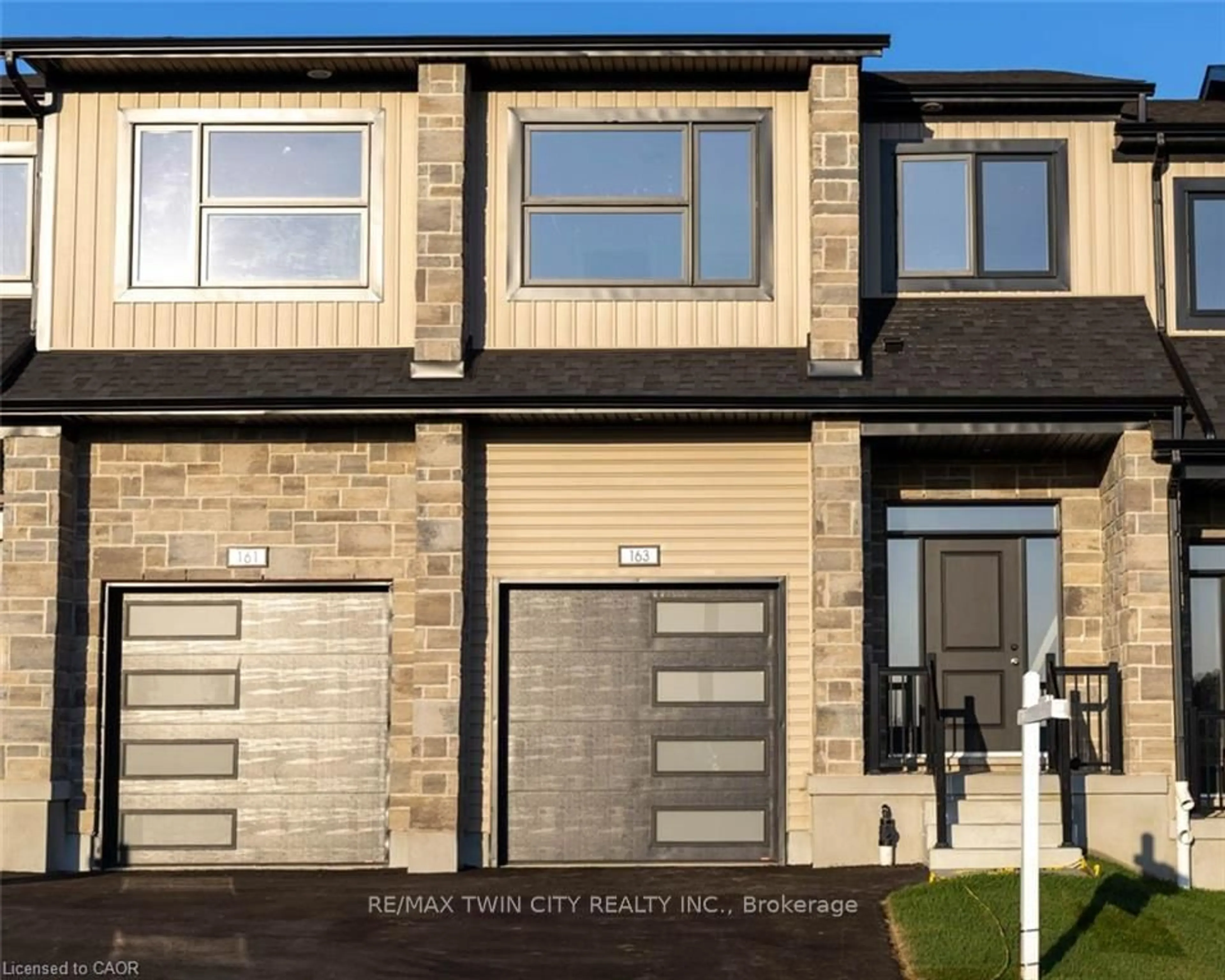 Home with vinyl exterior material, street for 163 Dunnigan Dr, Kitchener Ontario N2B 0B1