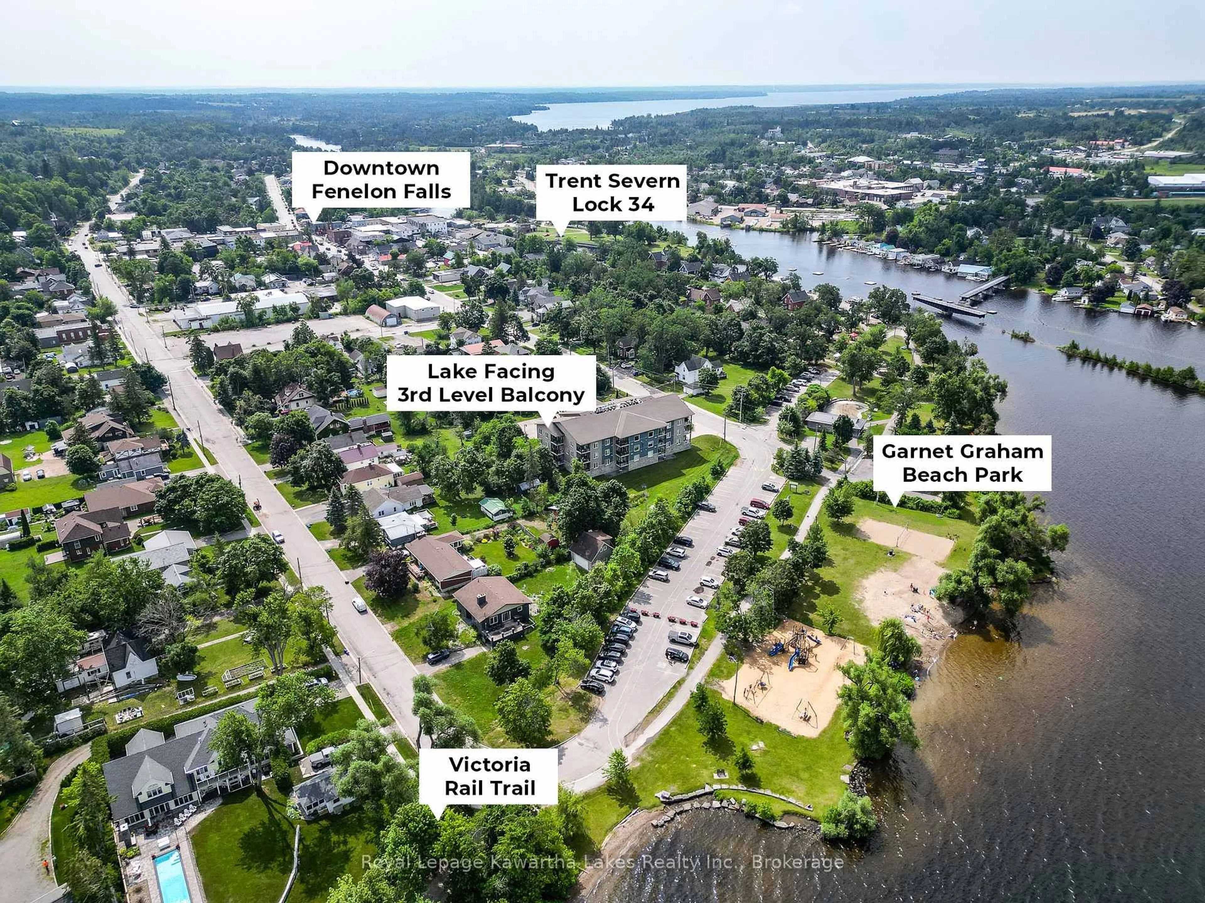 A pic from outside/outdoor area/front of a property/back of a property/a pic from drone, water/lake/river/ocean view for 94 Francis St #308, Kawartha Lakes Ontario K0M 1N0