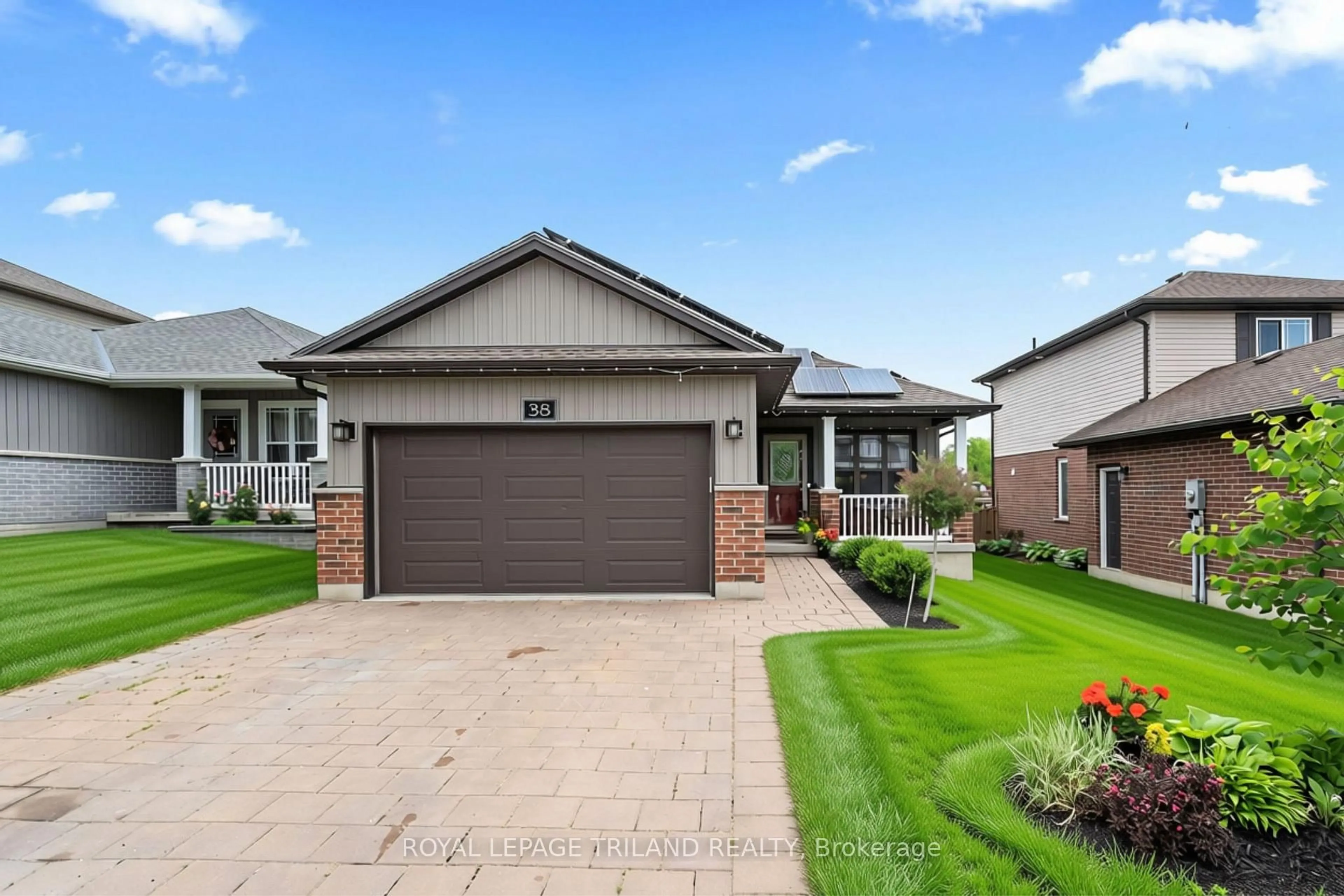 Home with brick exterior material, street for 38 LEESBORO Tr, Thames Centre Ontario N0M 2P0