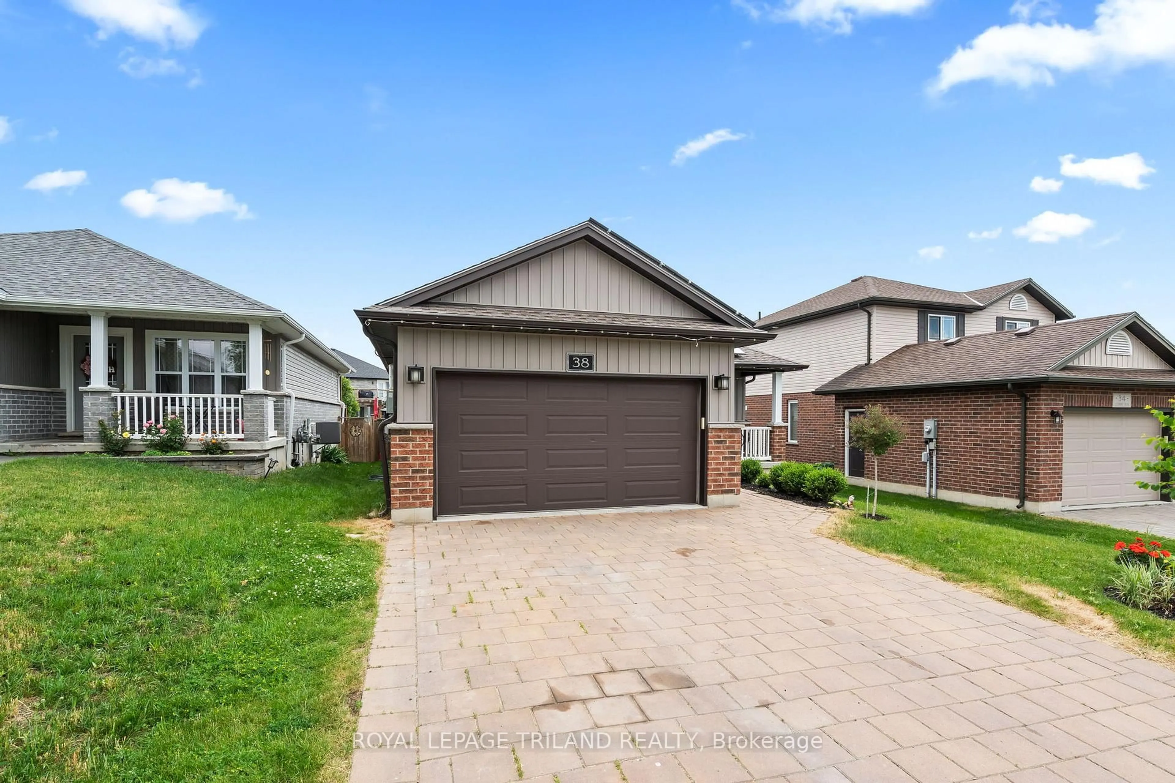 Home with brick exterior material, street for 38 LEESBORO Tr, Thames Centre Ontario N0M 2P0