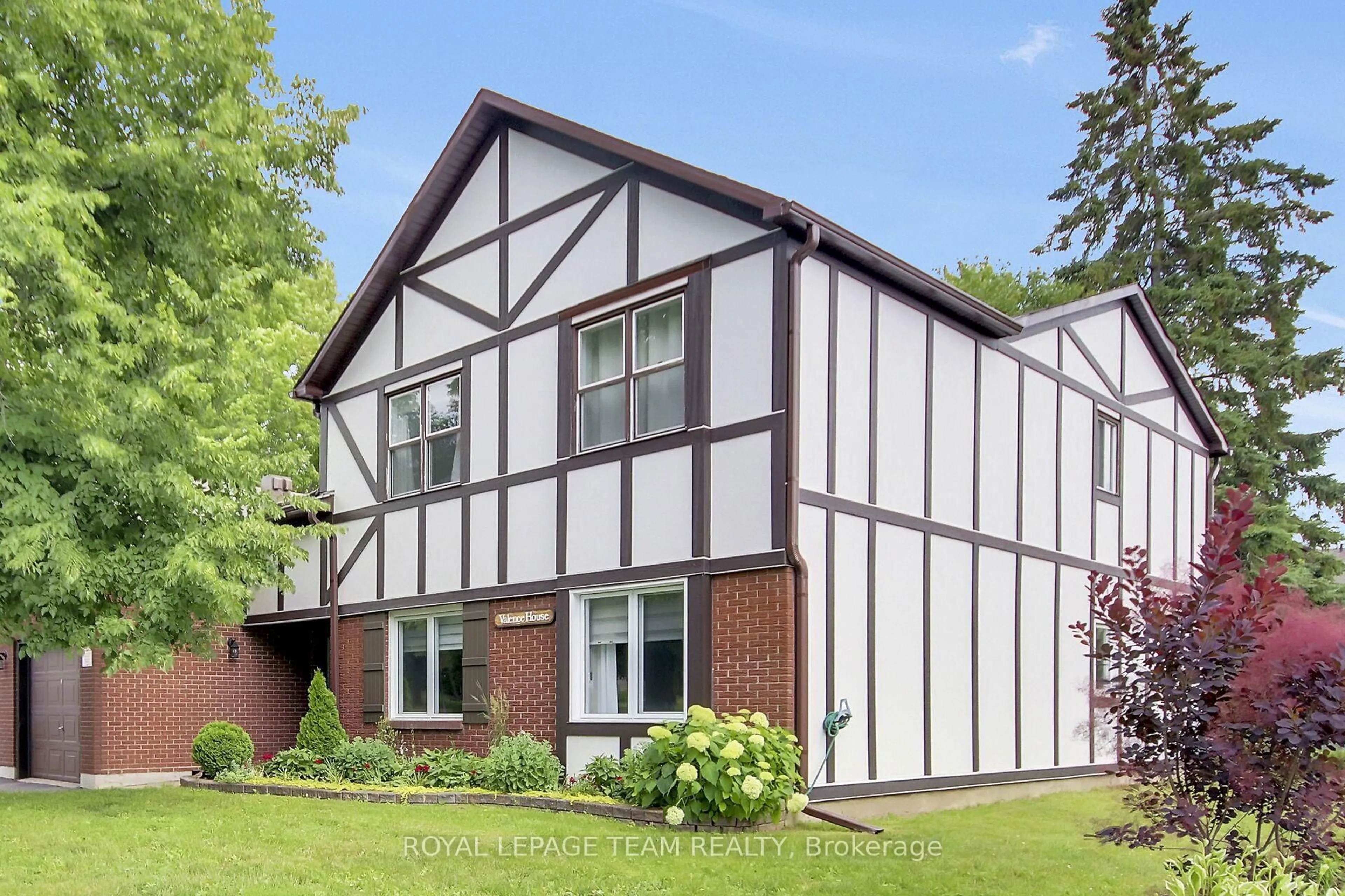 Home with vinyl exterior material, street for 10 Stonehill Crt #B, Kanata Ontario K2M 1E5