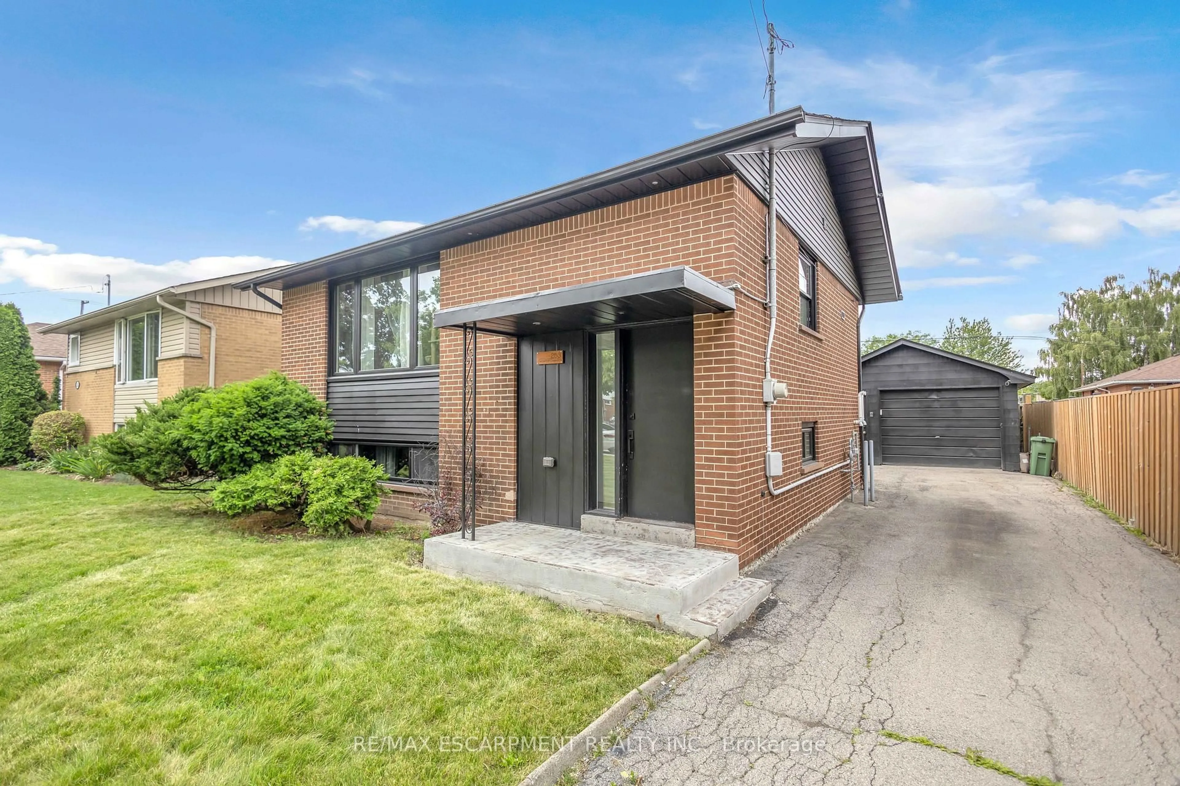 Home with brick exterior material, street for 253 Fernwood Cres, Hamilton Ontario L8T 3L7