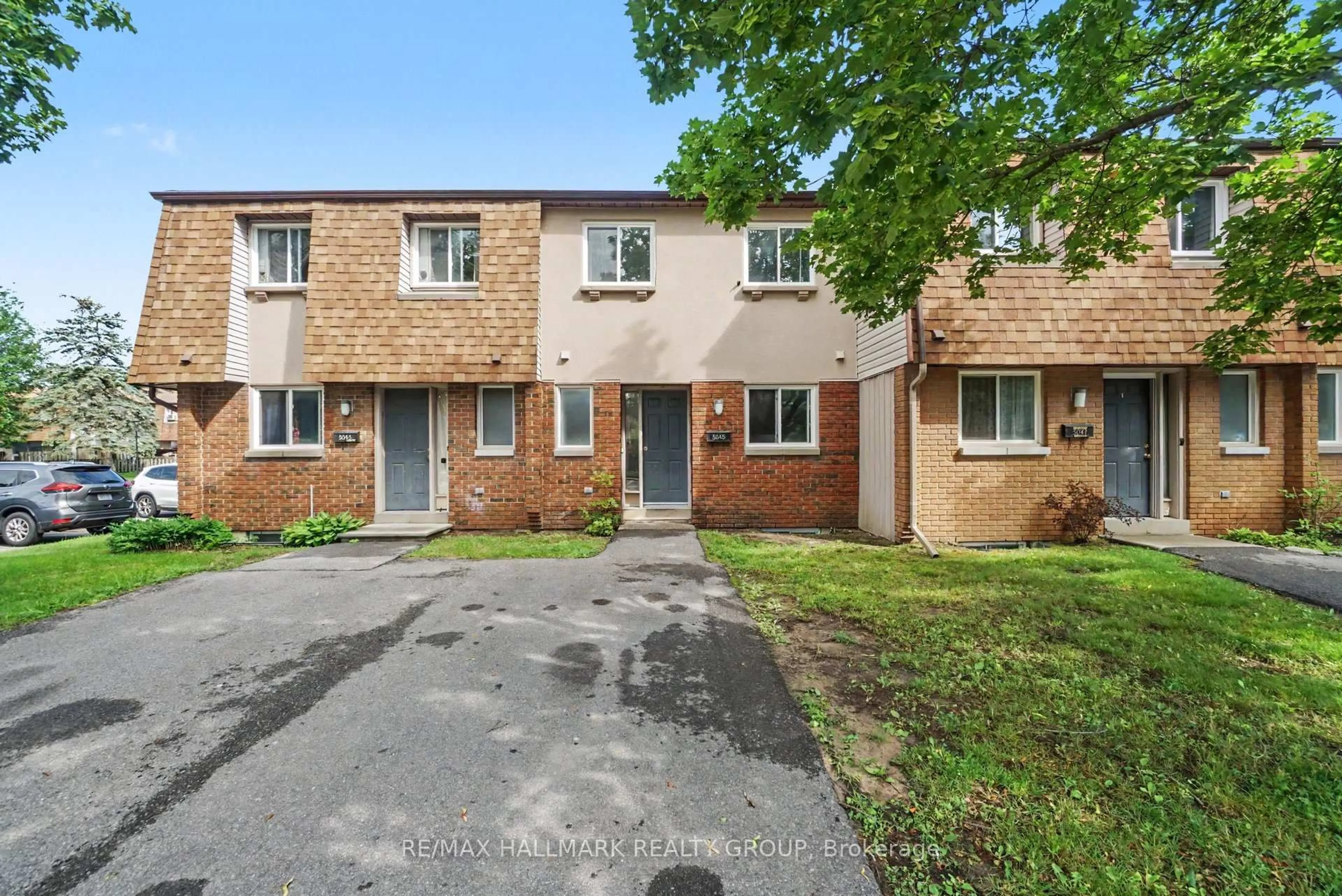 A pic from outside/outdoor area/front of a property/back of a property/a pic from drone, street for 3045 Olympic Way #101, Ottawa Ontario K1T 1Y5