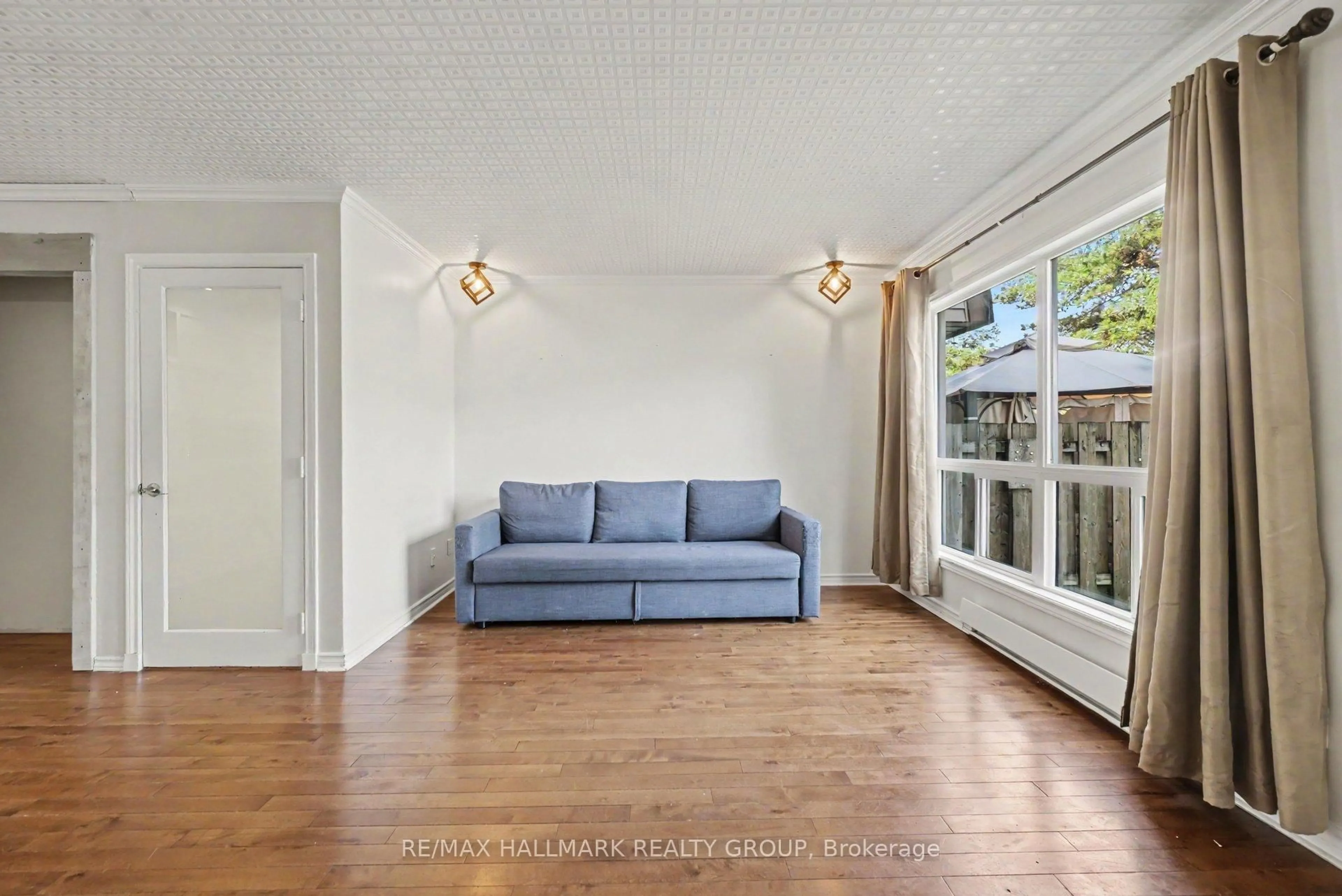 Living room with furniture, unknown for 3045 Olympic Way #101, Ottawa Ontario K1T 1Y5