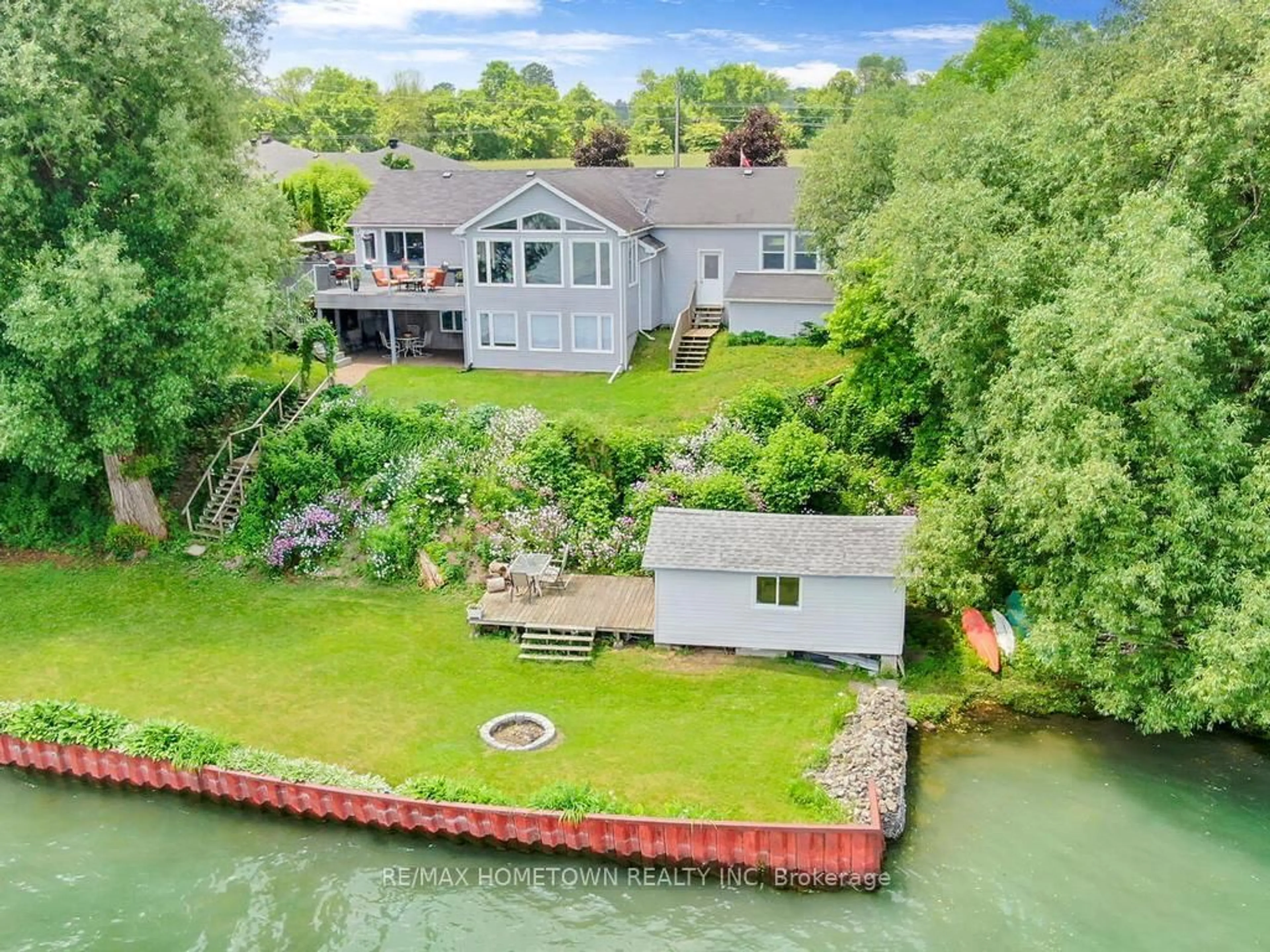A pic from outside/outdoor area/front of a property/back of a property/a pic from drone, water/lake/river/ocean view for 1435 County Road 2 Rd, Augusta Ontario K0E 1T0
