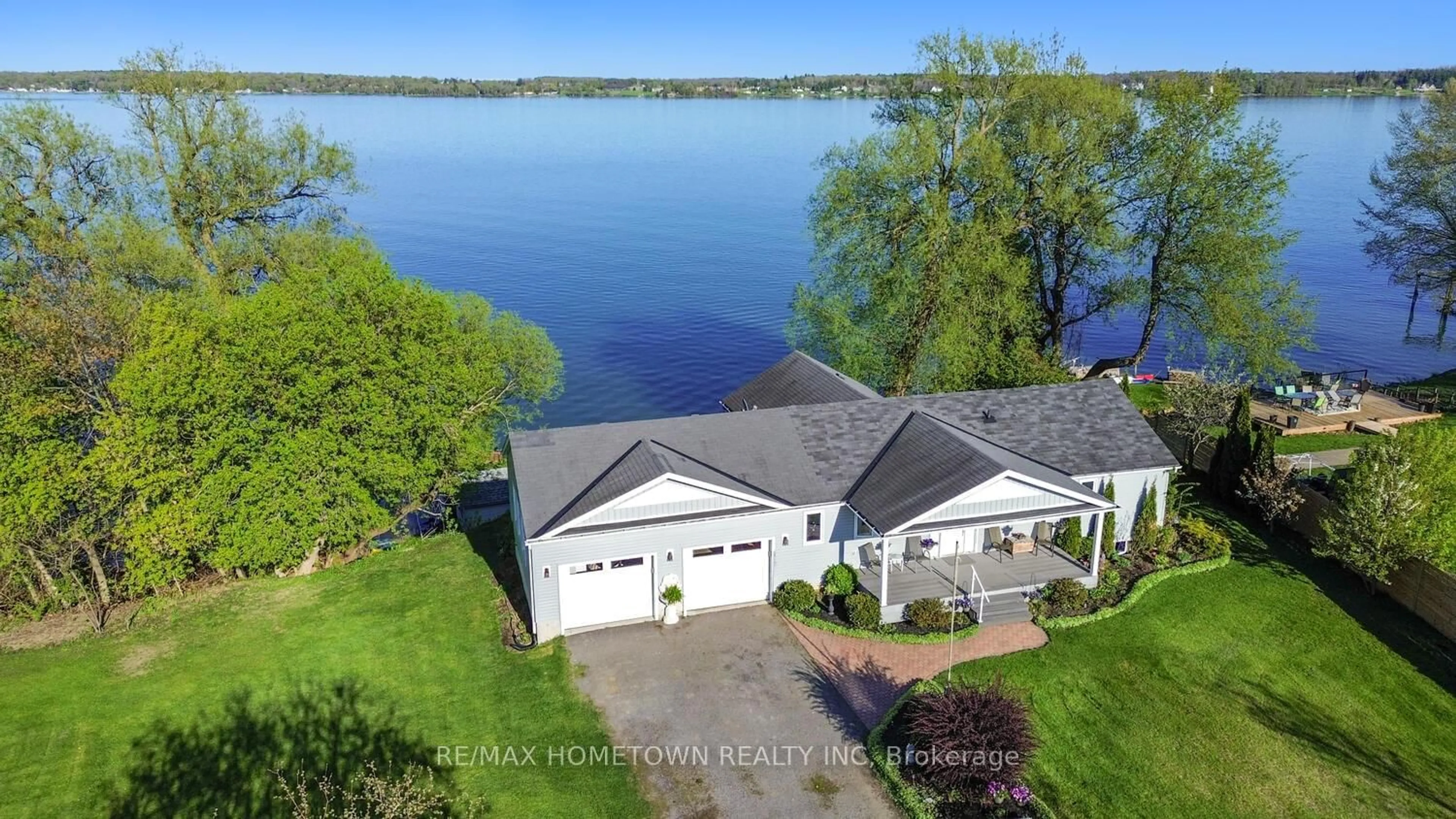 A pic from outside/outdoor area/front of a property/back of a property/a pic from drone, water/lake/river/ocean view for 1435 County Road 2 Rd, Augusta Ontario K0E 1T0
