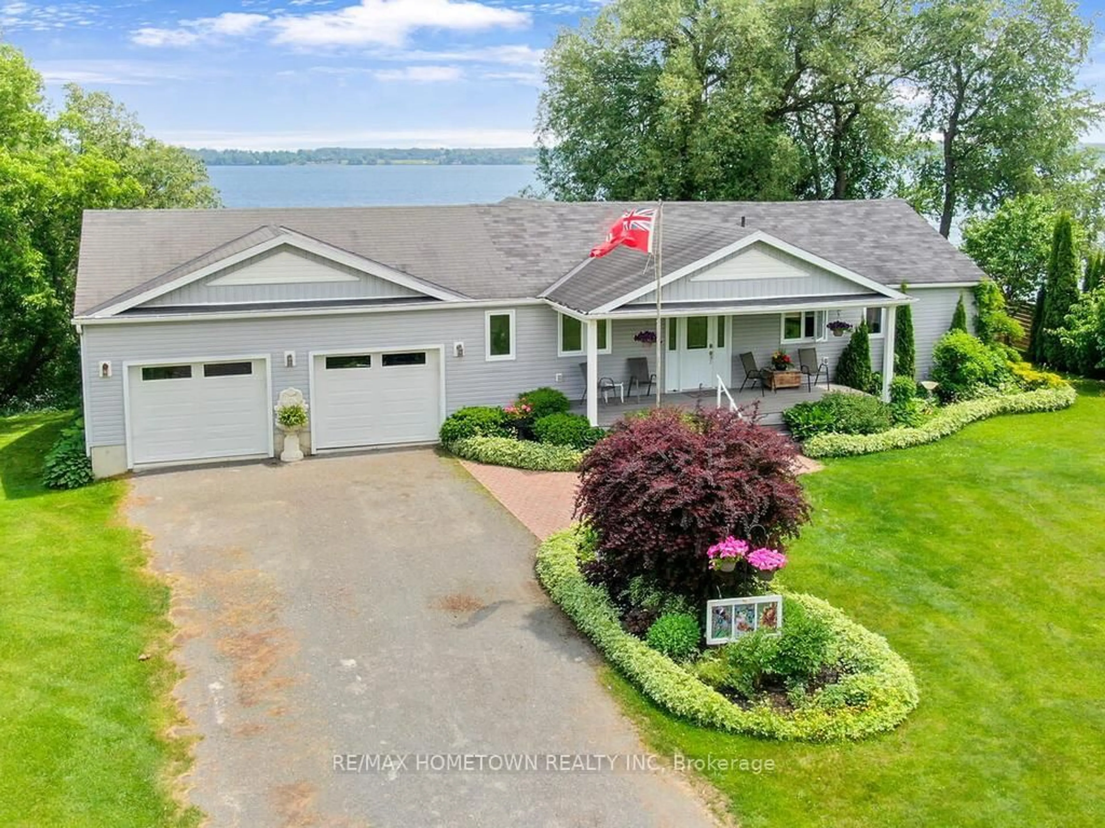A pic from outside/outdoor area/front of a property/back of a property/a pic from drone, water/lake/river/ocean view for 1435 County Road 2 Rd, Augusta Ontario K0E 1T0