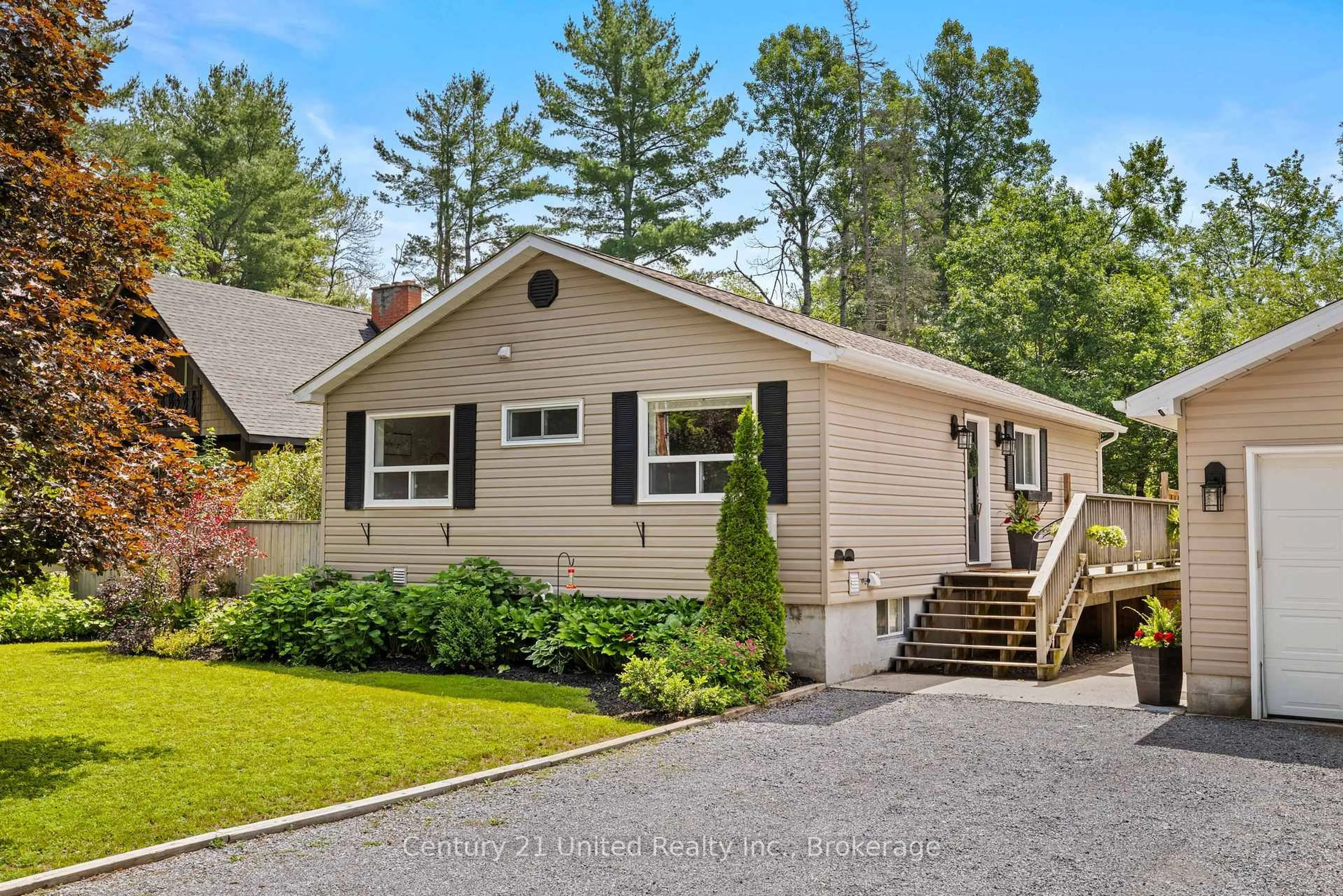 Home with vinyl exterior material, street for 31 River St, North Kawartha Ontario K0L 1A0