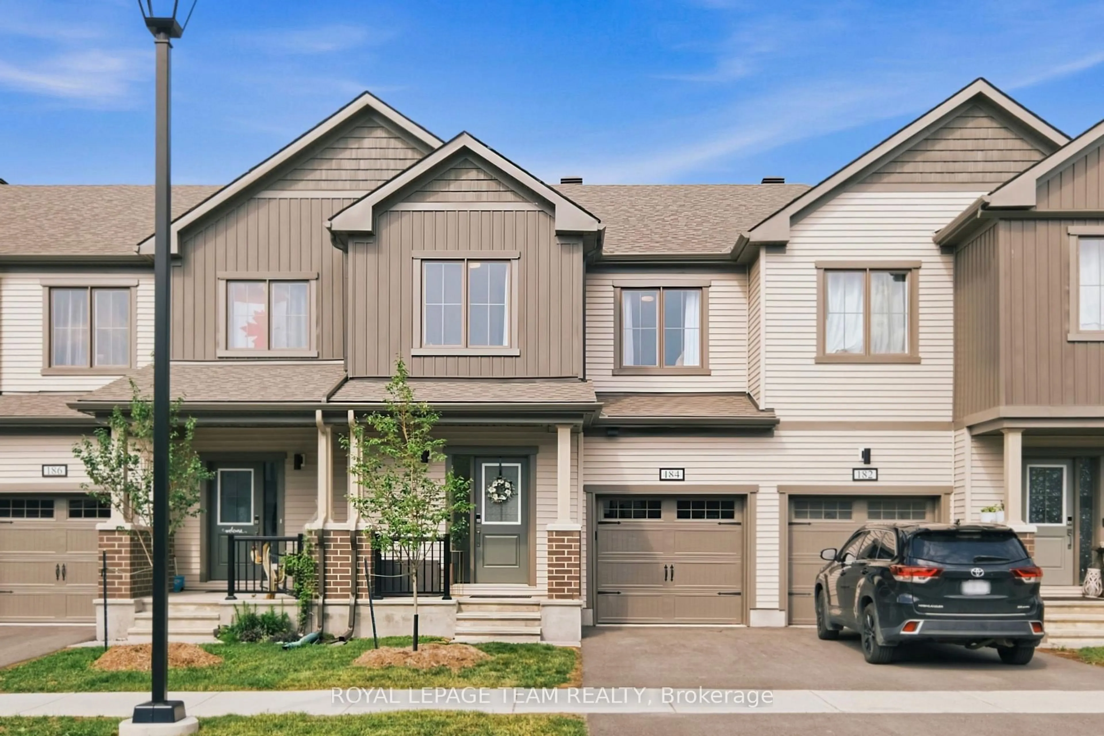 Home with brick exterior material, street for 184 Robert Perry St, North Grenville Ontario K0G 1J0