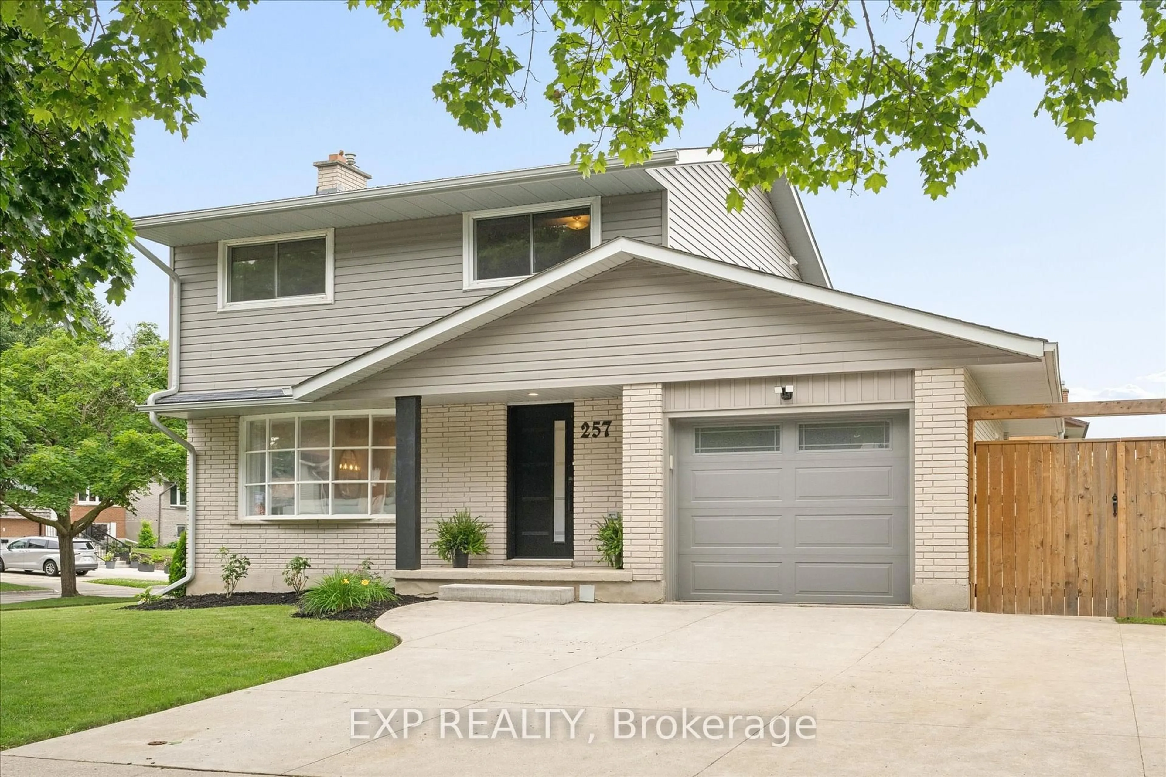 Home with vinyl exterior material, street for 257 Laurentian Dr, Kitchener Ontario N2E 2G5