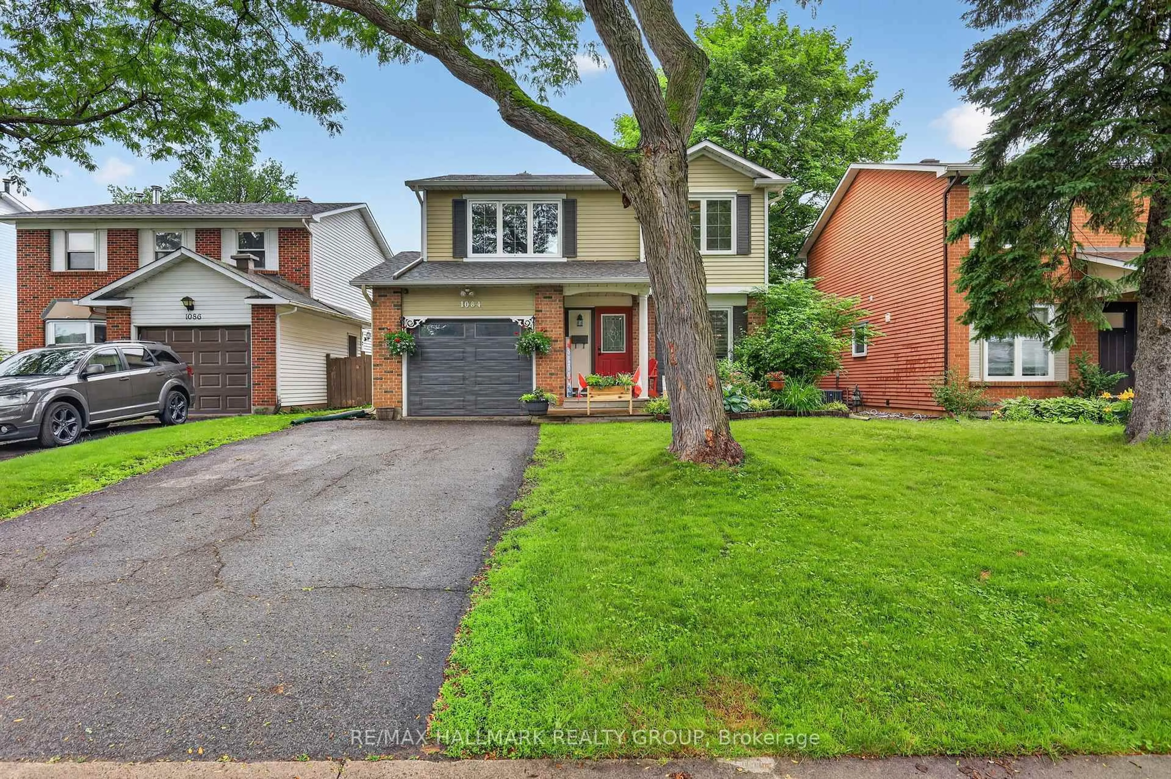 Home with brick exterior material, street for 1084 St Germain Cres, Ottawa Ontario K1C 2L8