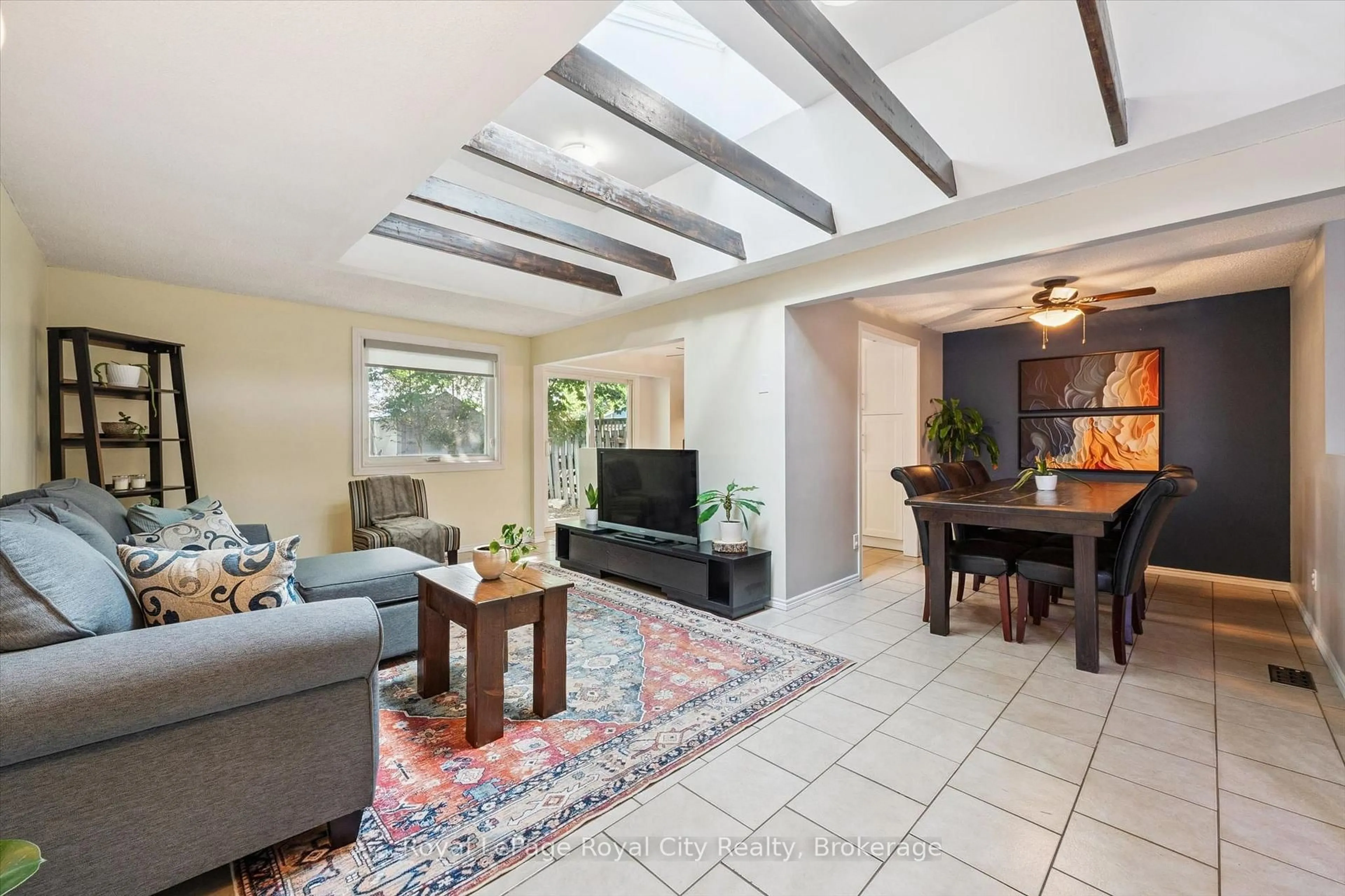 Living room with furniture, ceramic/tile floor for 300 Auden Rd, Guelph Ontario N1E 6S3