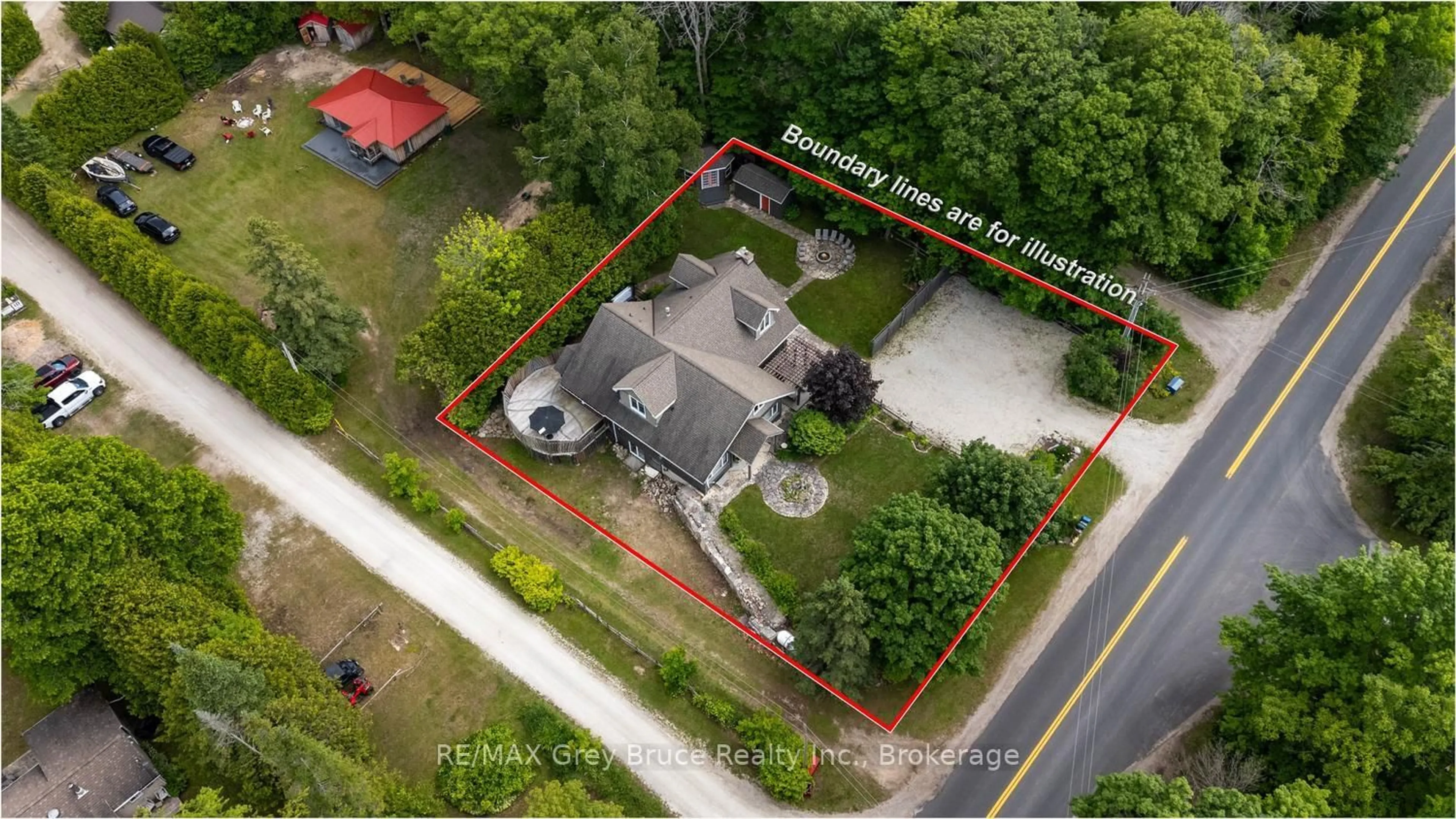 A pic from outside/outdoor area/front of a property/back of a property/a pic from drone, street for 424 Huron Rd, South Bruce Peninsula Ontario N0H 2T0
