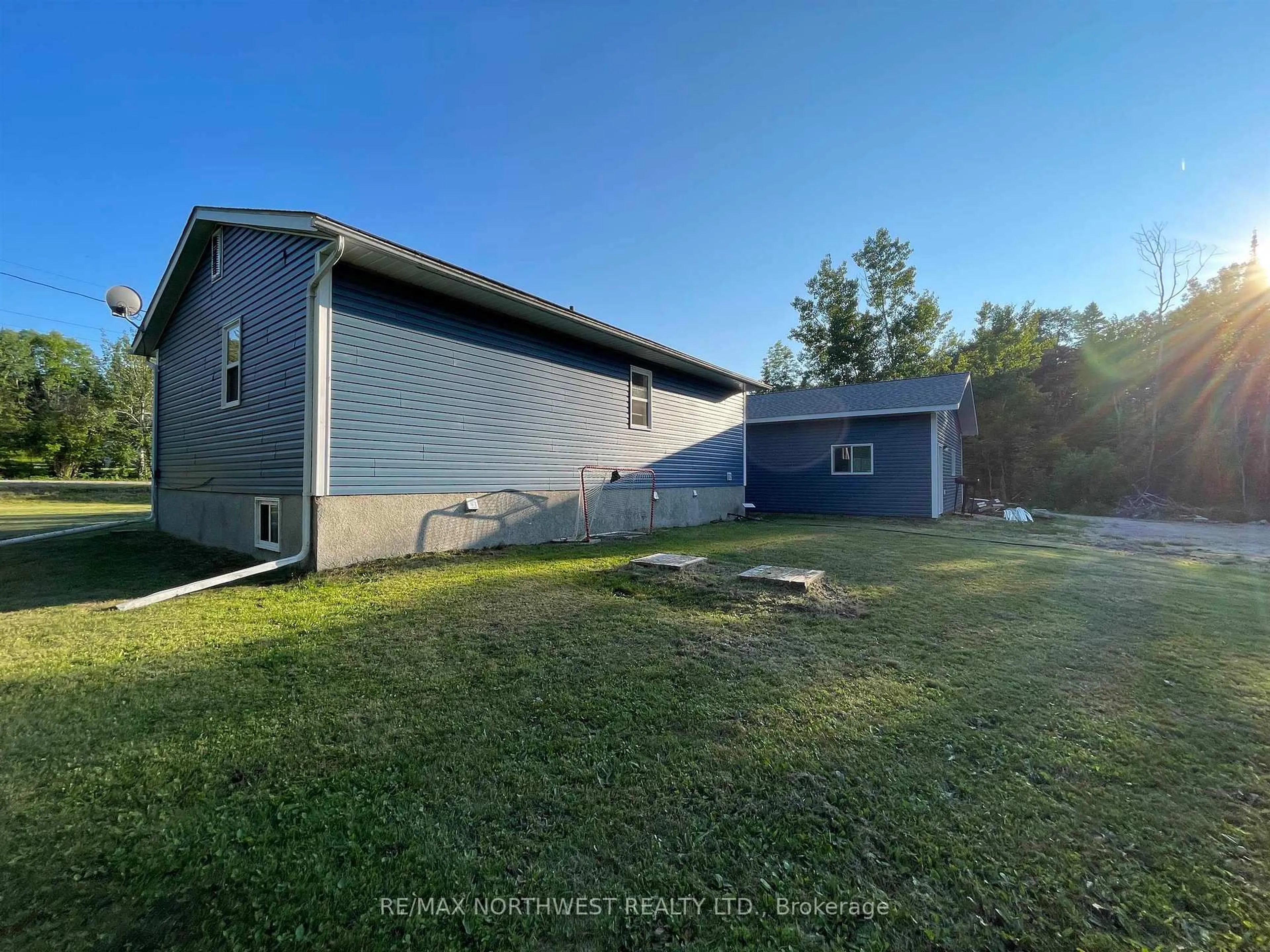 A pic from outside/outdoor area/front of a property/back of a property/a pic from drone, unknown for 9 Rodgers Road, Dryden Ontario P8N 2Y4