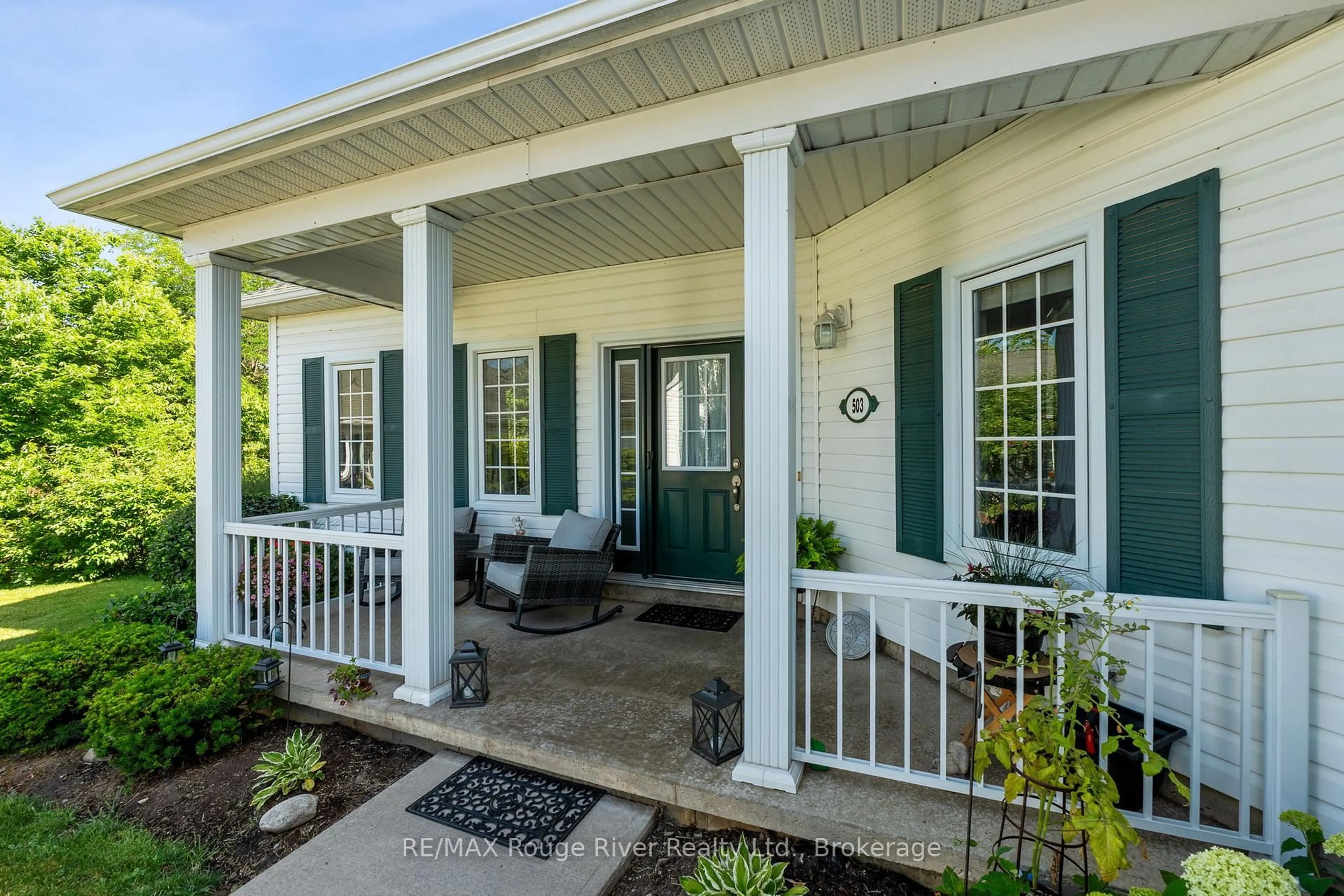 Home with vinyl exterior material, street for 325 Densmore Rd #503, Cobourg Ontario K9A 0E4