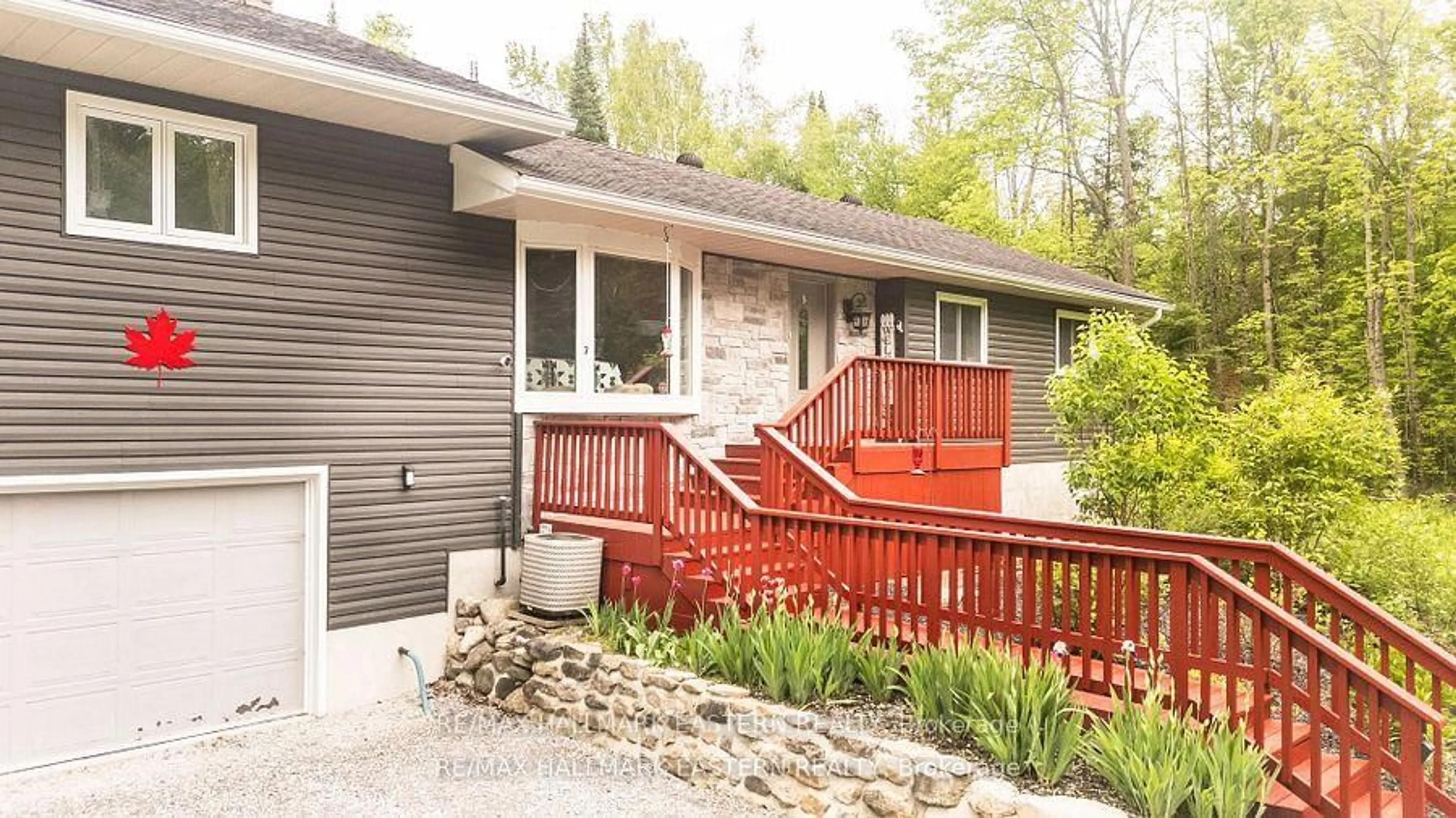 Home with vinyl exterior material, street for 7 Juniper Isle Rd, Kawartha Lakes Ontario K0M 1N0
