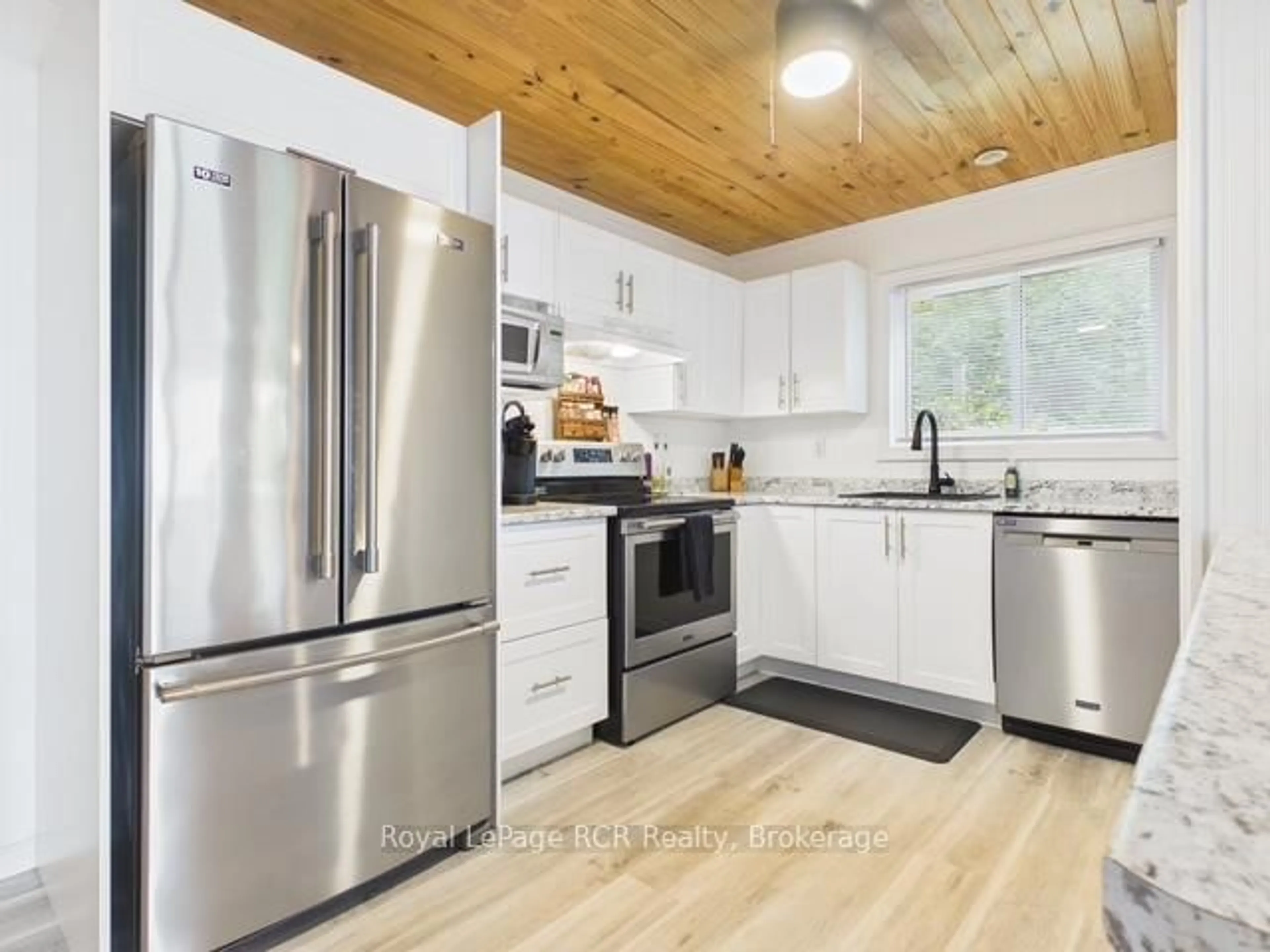 Open concept kitchen, wood/laminate floor for 86457 Mclean St, Ashfield-Colborne-Wawanosh Ontario N2Z 2X3