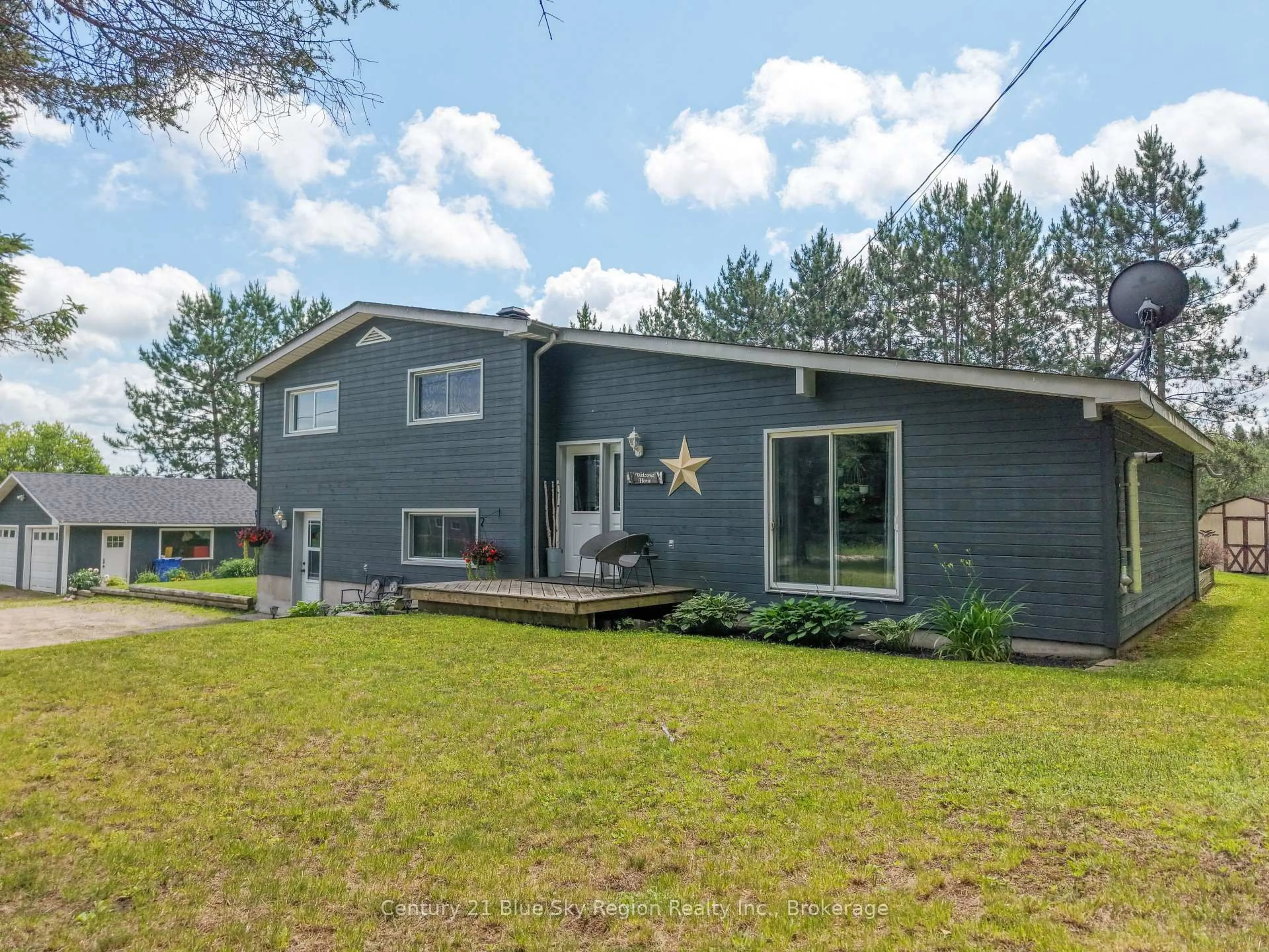 Home with vinyl exterior material, street for 128 Hurtubise Rd, East Ferris Ontario P0H 1K0