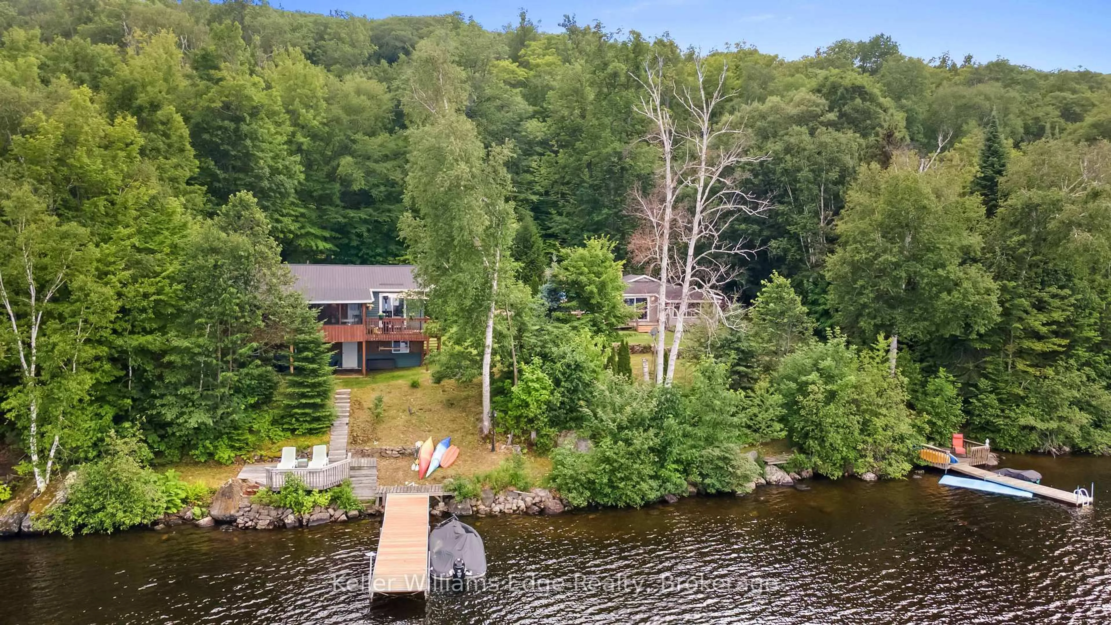 A pic from outside/outdoor area/front of a property/back of a property/a pic from drone, water/lake/river/ocean view for 1128 KAMANISKEG LAKE Rd, Combermere Ontario K0J 1L0
