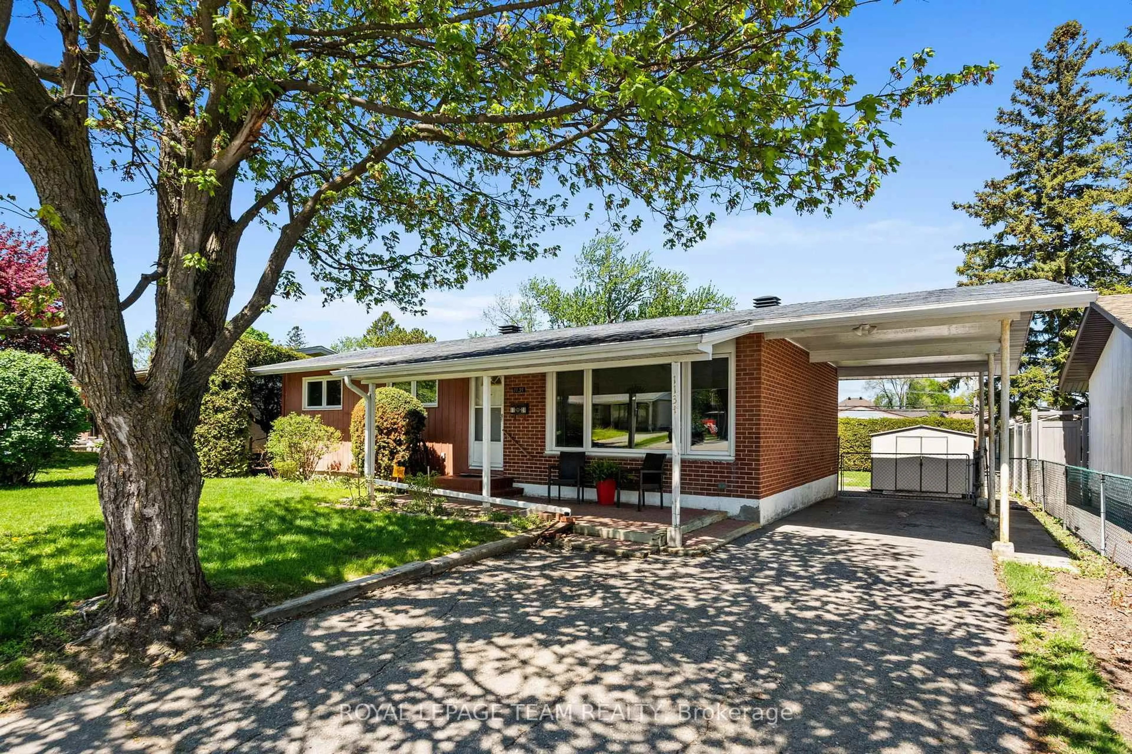 Home with brick exterior material, street for 1131 Deer Park Rd, Ottawa Ontario K2E 6G7