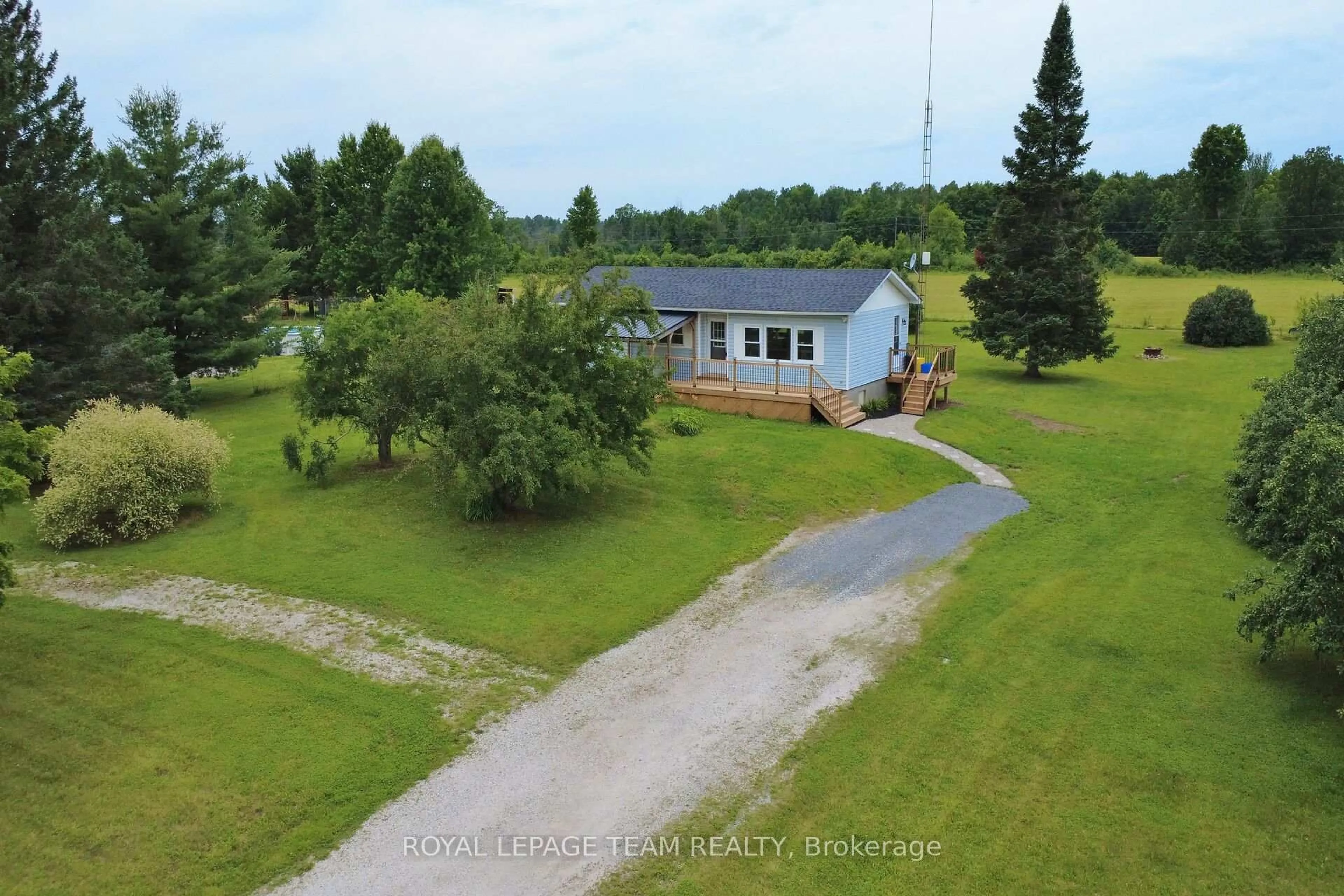 A pic from outside/outdoor area/front of a property/back of a property/a pic from drone, water/lake/river/ocean view for 174 Porter Rd, Smiths Falls Ontario K7A 4S4