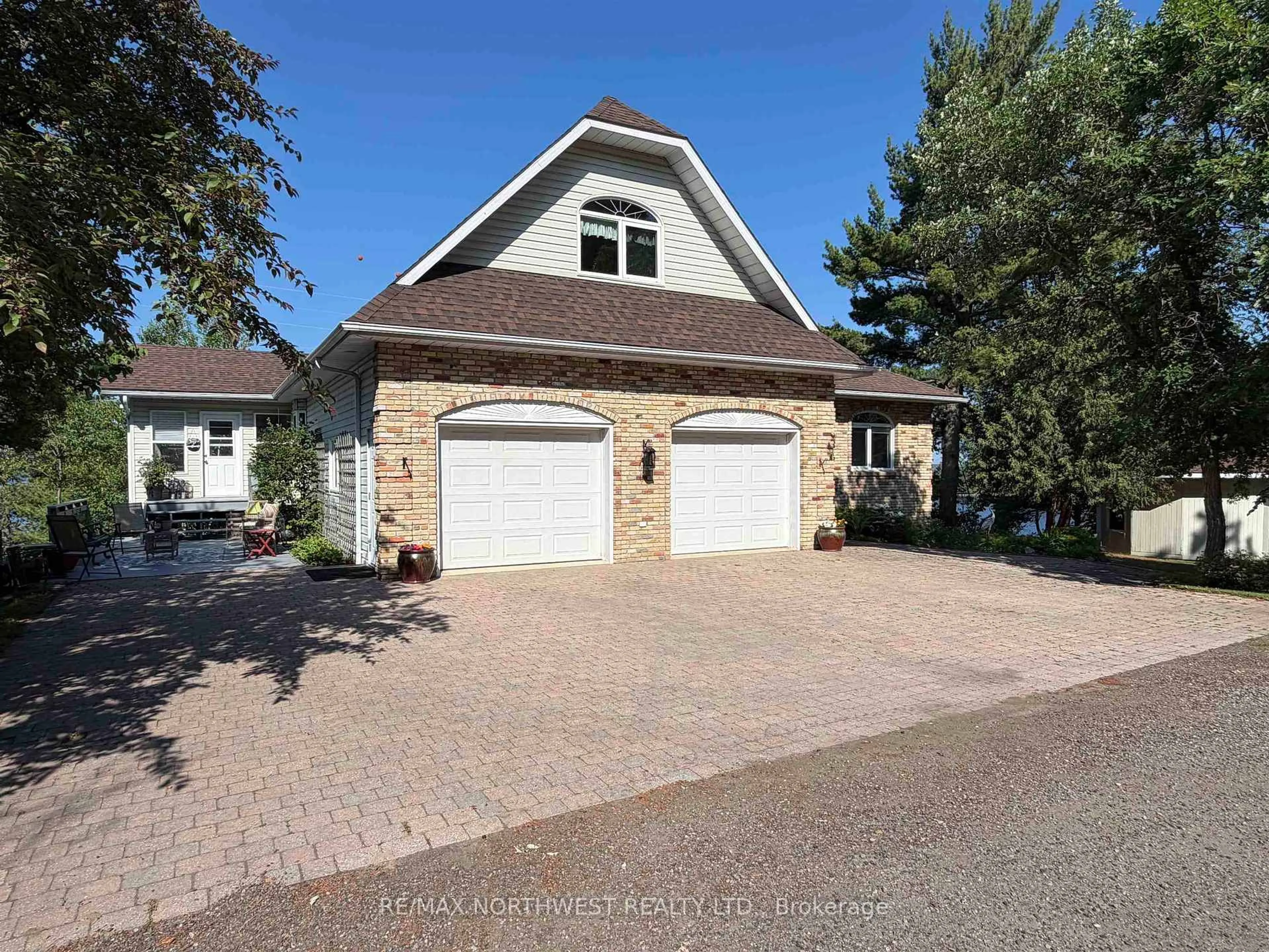 Home with brick exterior material, street for 498B HWY 11, Rainy River Remote Area Ontario P9A 3M3